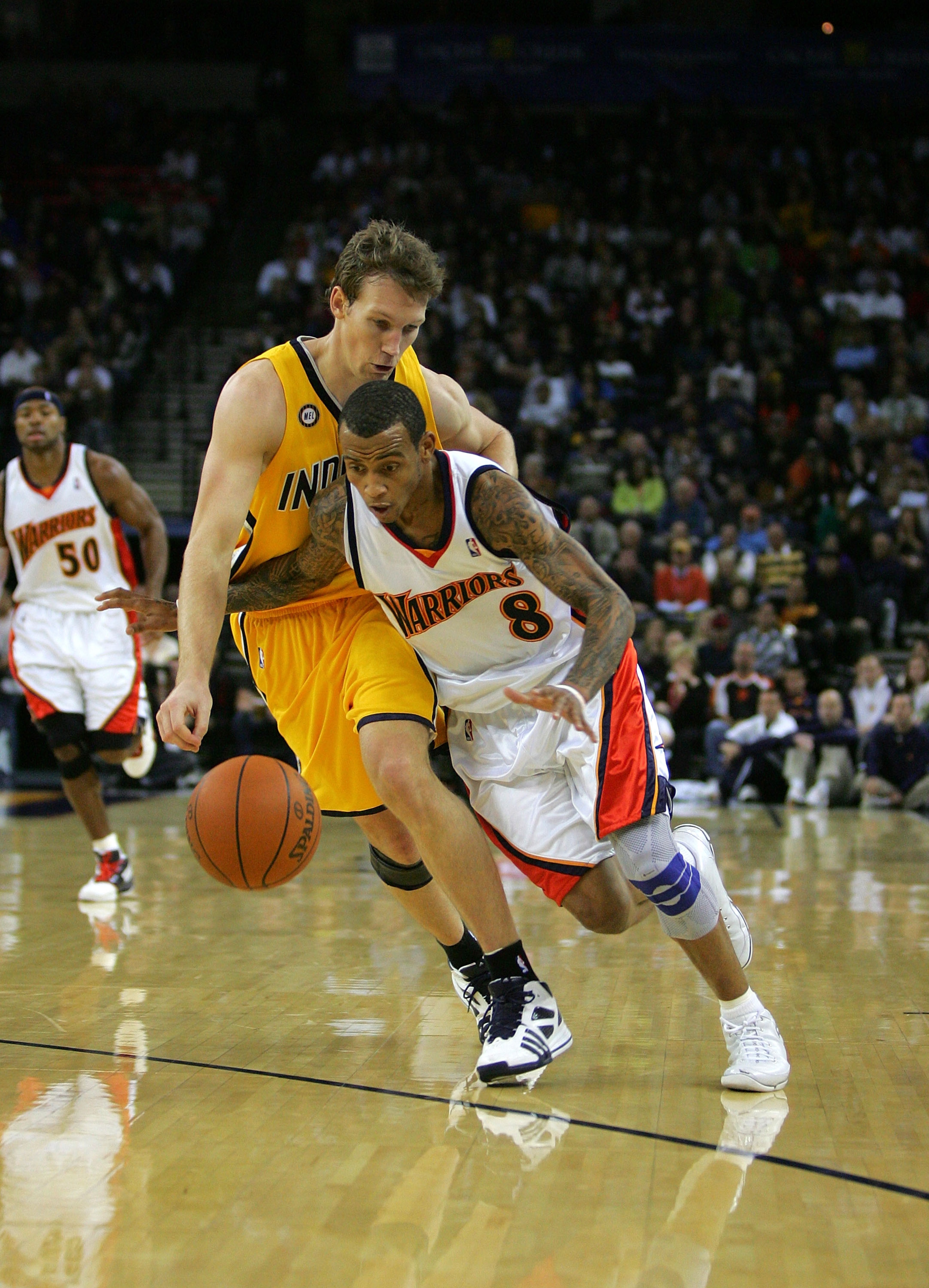 OAKLAND, CA - NOVEMBER 30:  Monta Ellis #8 of the Golden State Warriors drives past Mike Dunleavy #17 of the Indiana Pacers at Oracle Arena on November 30, 2009 in Oakland, California. Ellis finished with a career high 45 points.  (Photo by Ezra Shaw/Gett