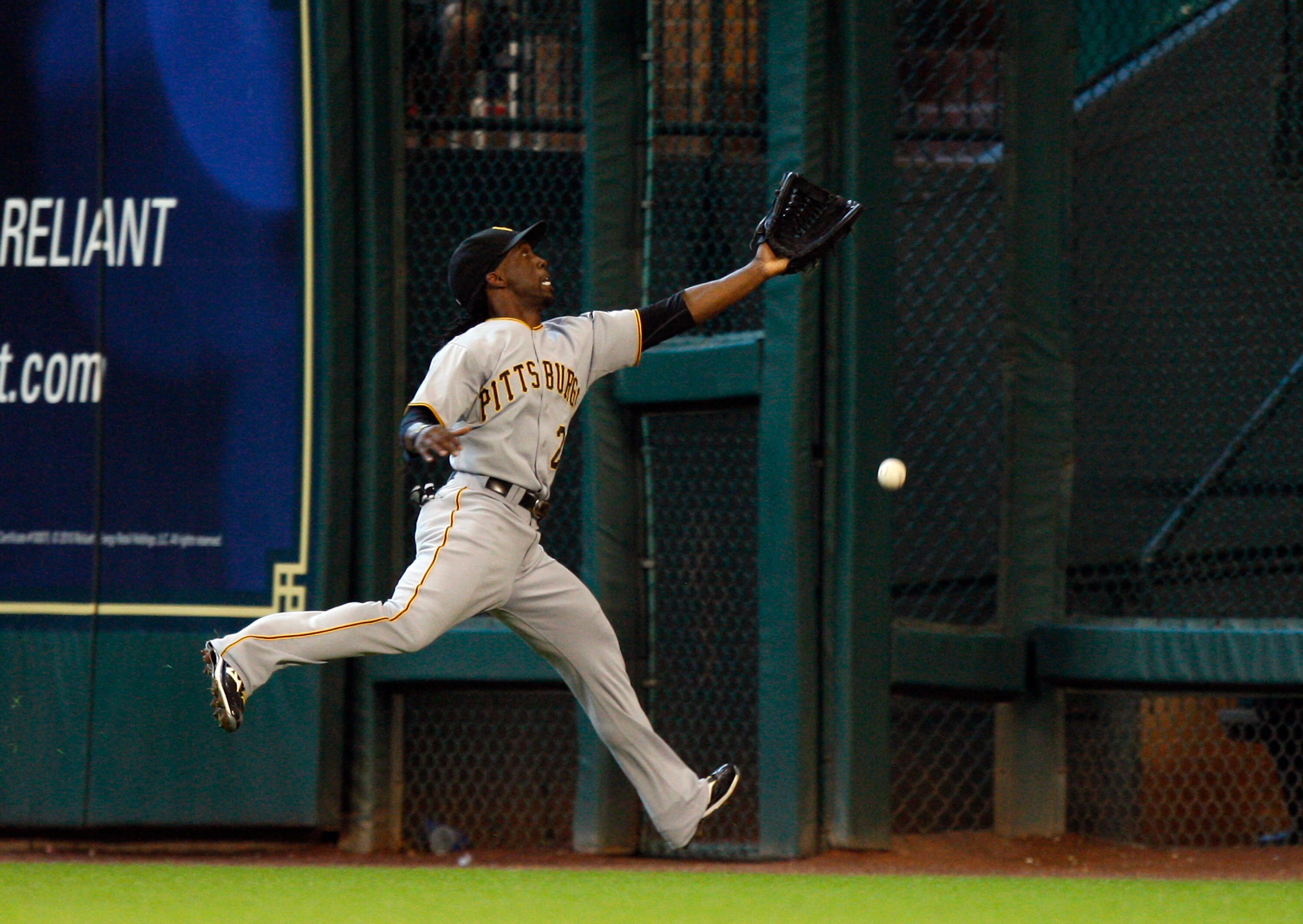 HOUSTON - AUGUST 15:  Center fielder Andrew McCutchen #22 of the Pittsburgh Pirates can not run down this ground rule double off the bat of Hunter Pence of the Houston Astros in the sixth inning at Minute Maid Park on August 15, 2010 in Houston, Texas.  (