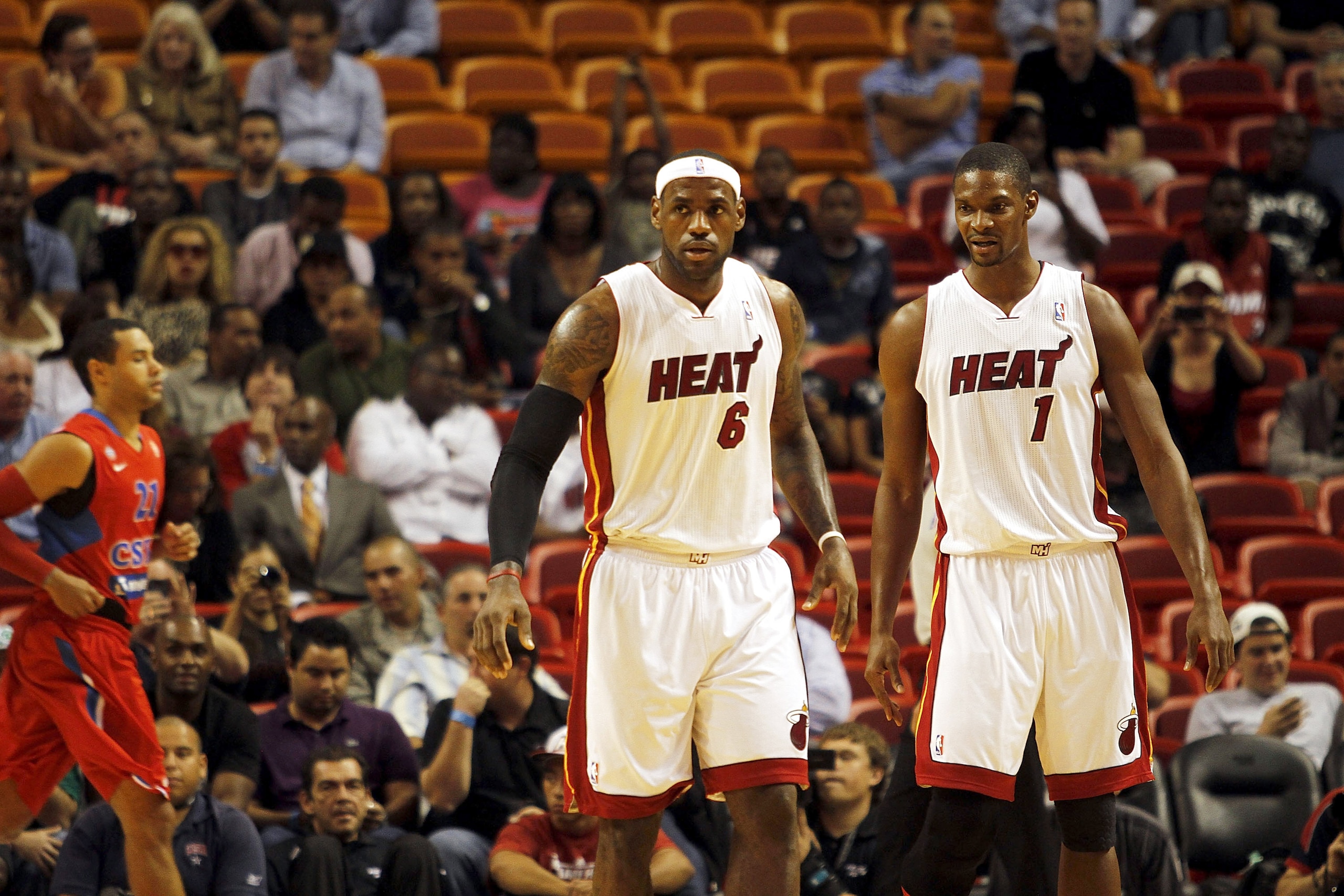 MIAMI - OCTOBER 12:  Forward LeBron James #6 and Chris Bosh #1 of the Miami Heat CSKA Moscow on October 12, 2010 in Miami, Florida.  Miami heat won 96-85 over CSKA Moscow.  NOTE TO USER: User expressly acknowledges and agrees that, by downloading and or u