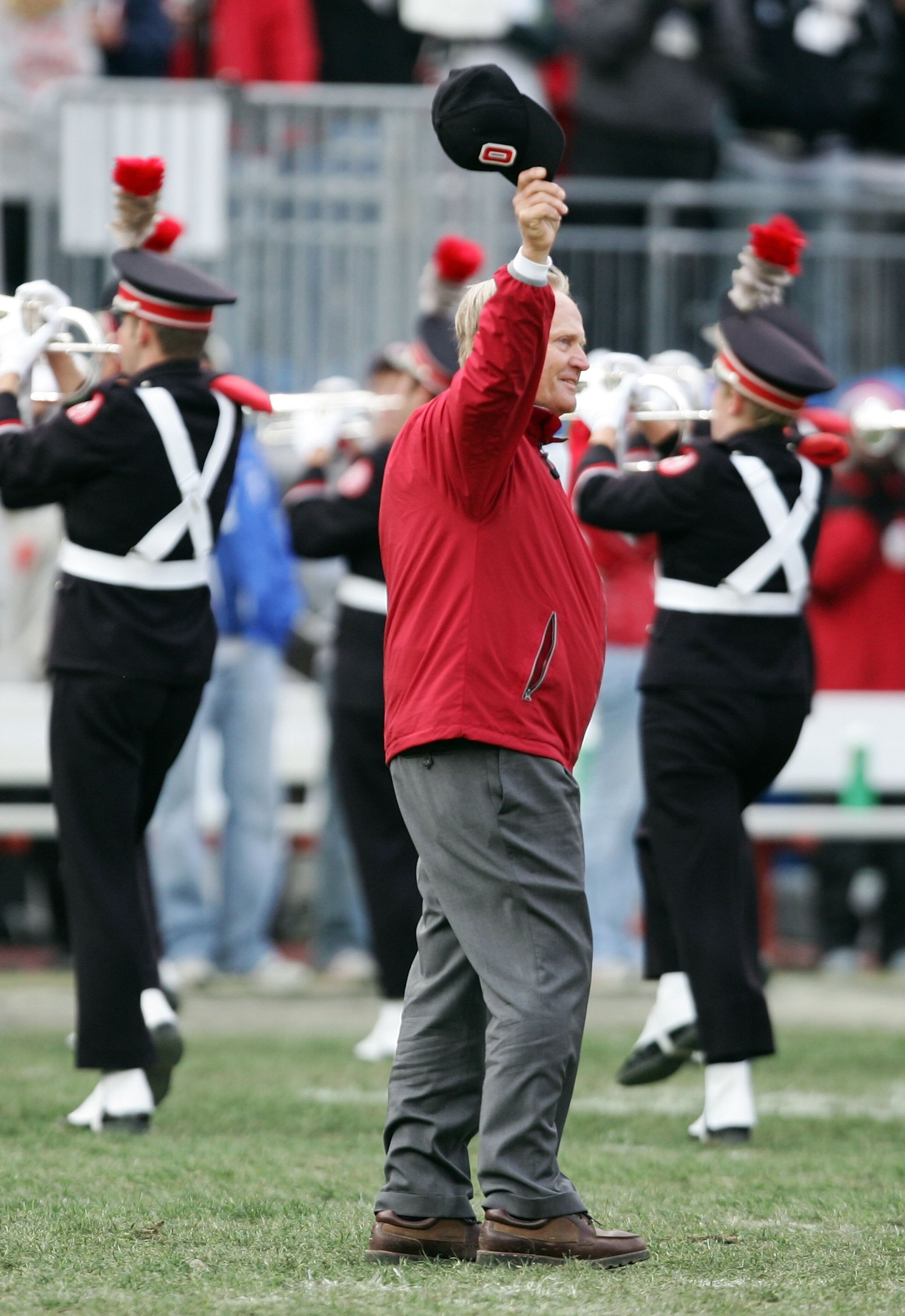 COLUMBUS, OH - OCTOBER 28:  Golf legend Jack Nicklaus waves to the crowd from the field as he dots the i in Ohio formed by the marching band during the half-time show at Ohio Stadium on October 28, 2006 in Columbus, Ohio.  (Photo by Harry How/Getty Images