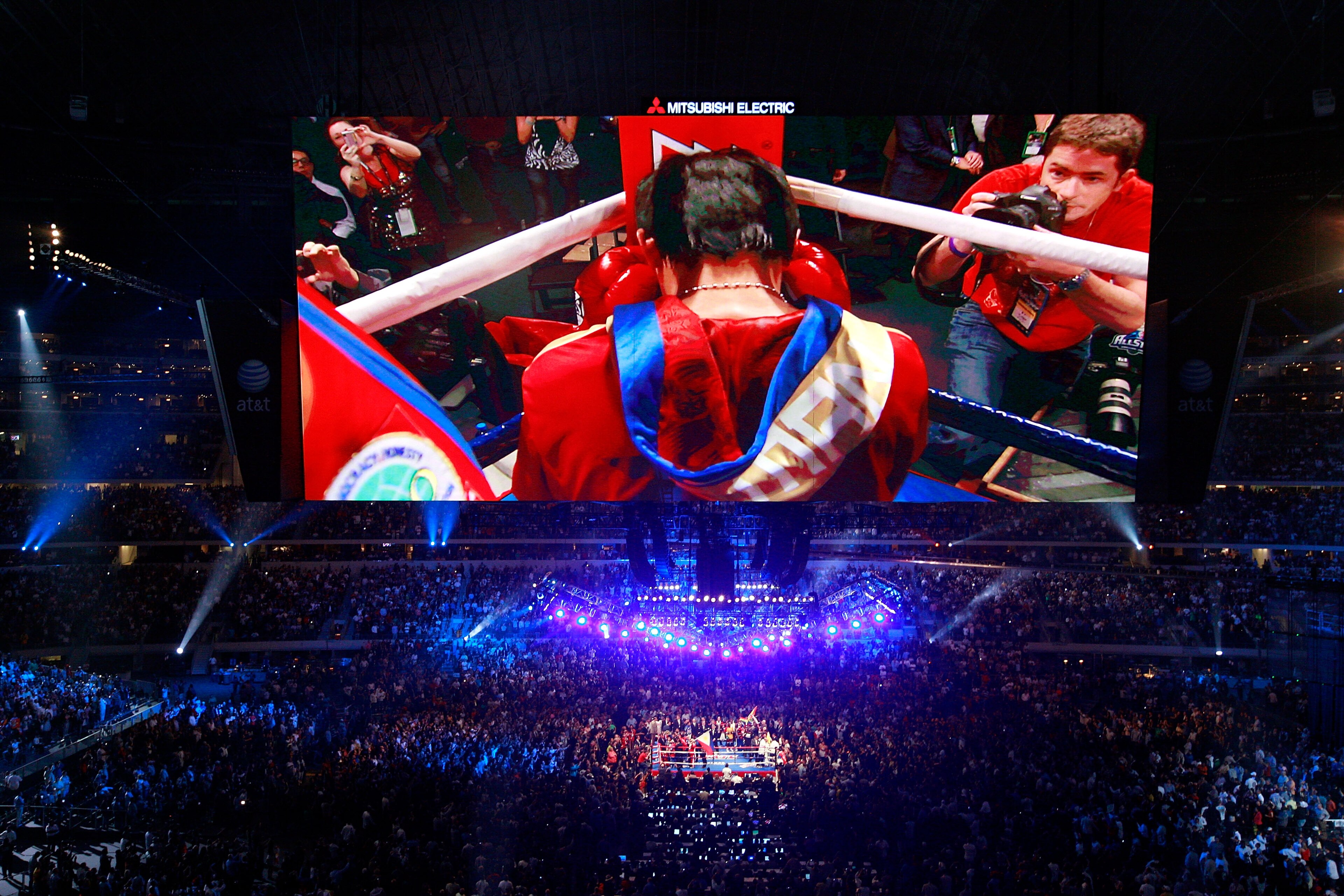 ARLINGTON, TX - MARCH 13: Manny Pacquiao of the Philippines prays in the ring before taking on Joshua Clottey of Ghana during the WBO welterweight title fight at Cowboys Stadium on March 13, 2010 in Arlington, Texas. (Photo by Tom Pennington/Getty Image ARLINGTON, TX - MARCH 13: Manny Pacquiao of the Philippines prays in the ring before taking on Joshua Clottey of Ghana during the WBO welterweight title fight at Cowboys Stadium on March 13, 2010 in Arlington, Texas. (Photo by Tom Pennington/Getty Image