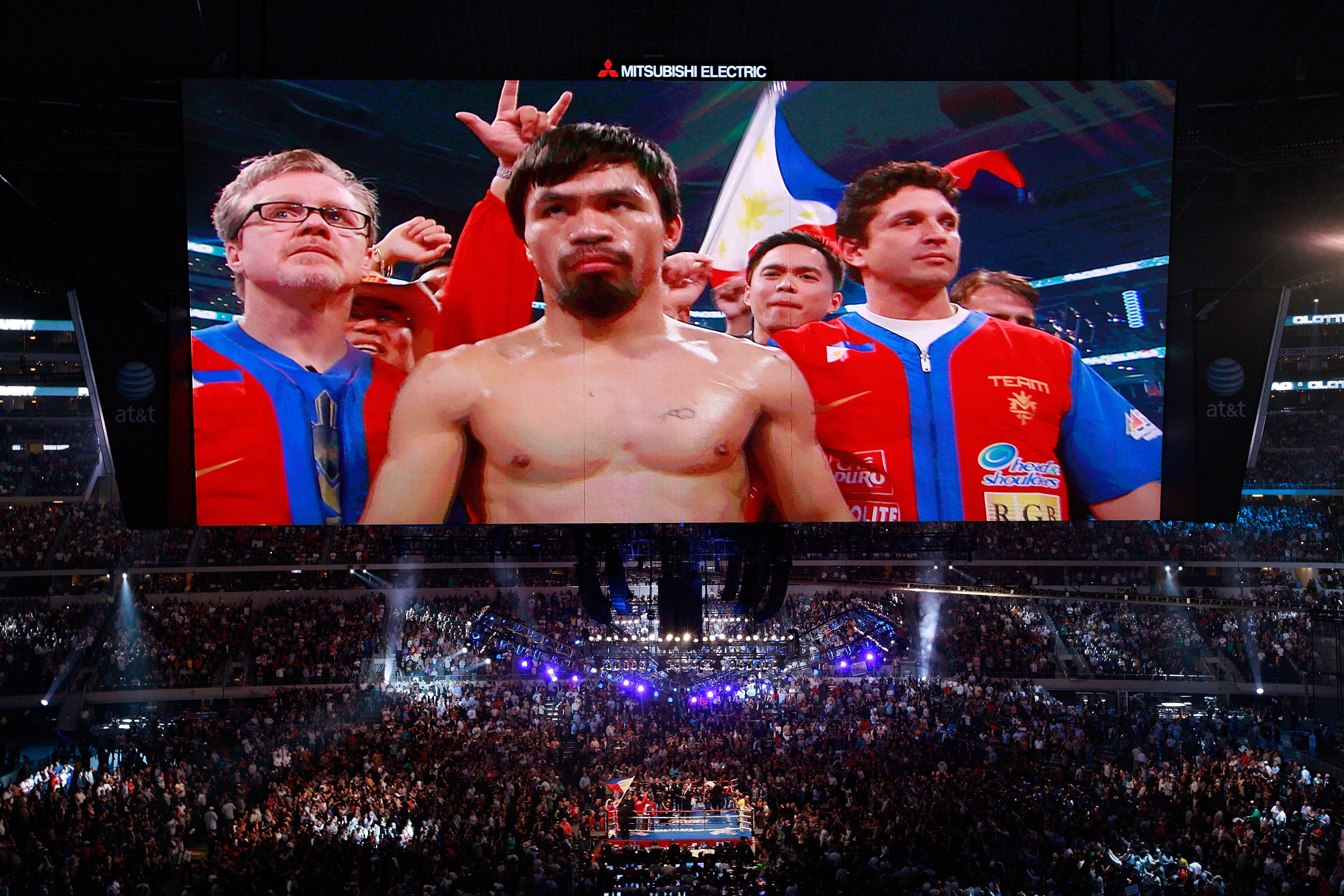 ARLINGTON, TX - MARCH 13:  Manny Pacquiao of the Philippines in the ring before taking on Joshua Clottey of Ghana during the WBO welterweight title fight at Cowboys Stadium on March 13, 2010 in Arlington, Texas.  (Photo by Tom Pennington/Getty Images)