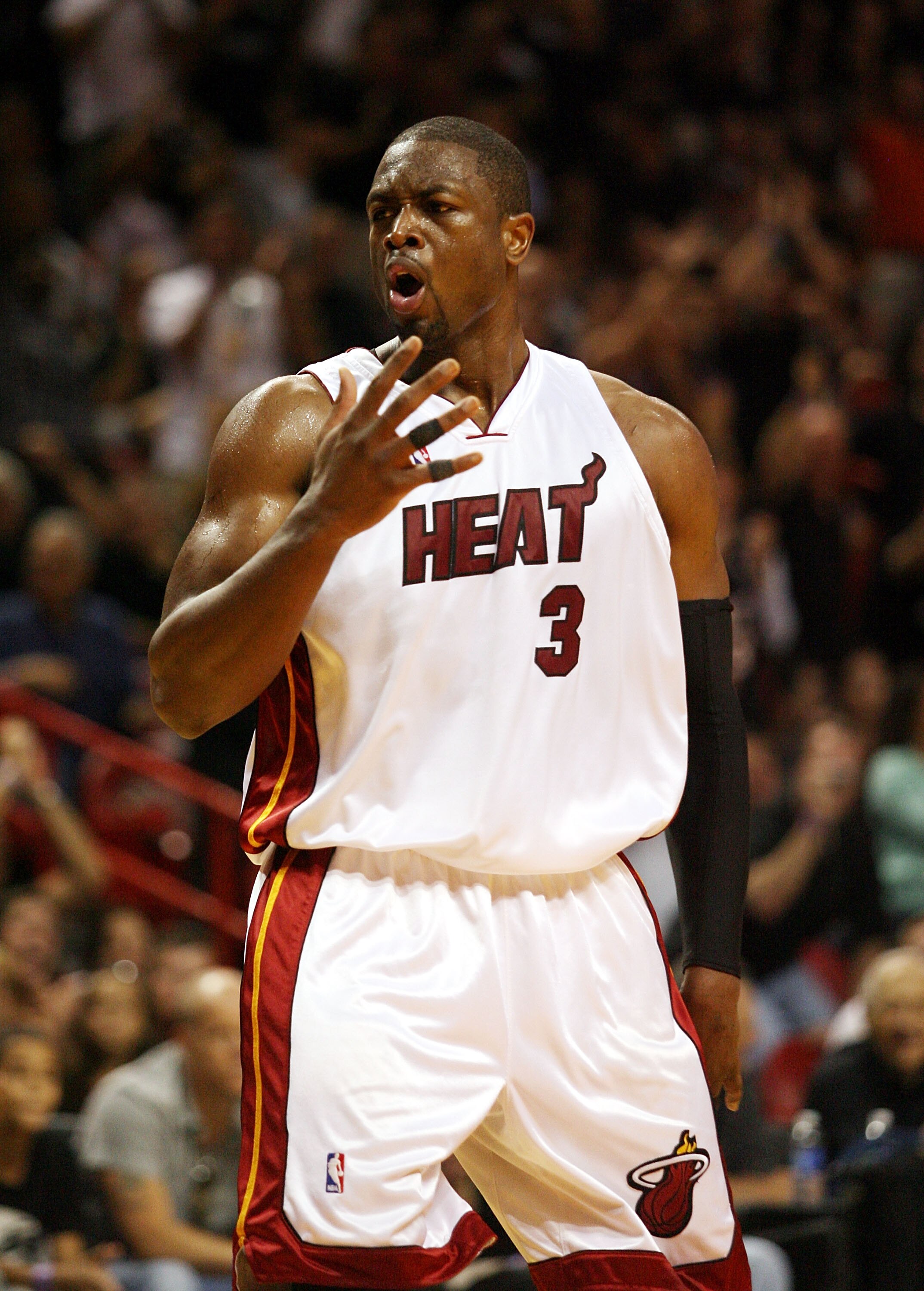 MIAMI - APRIL 25:  Guard Dwyane Wade #3 of the Miami Heat reacts against the Boston Celtics in Game Four of the Eastern Conference Quarterfinals during the 2010 NBA Playoffs at American Airlines Arena on April 25, 2010 in Miami, Florida. Wdae had 46 point