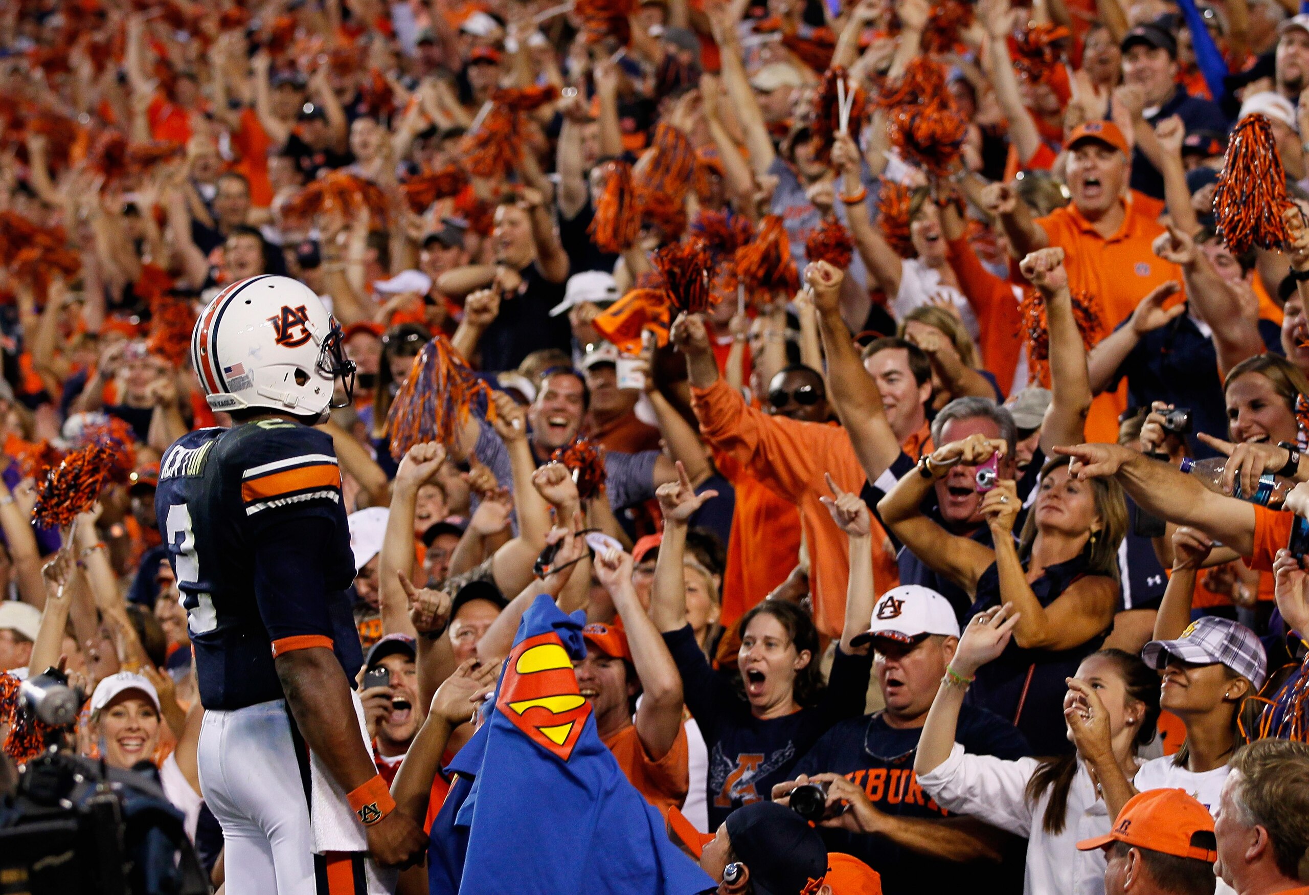AUBURN, AL - OCTOBER 23:  Quarterback Cameron Newton #2 of the Auburn Tigers celebrates with the fans after their 24-17 over the LSU Tigers at Jordan-Hare Stadium on October 23, 2010 in Auburn, Alabama.  (Photo by Kevin C. Cox/Getty Images)