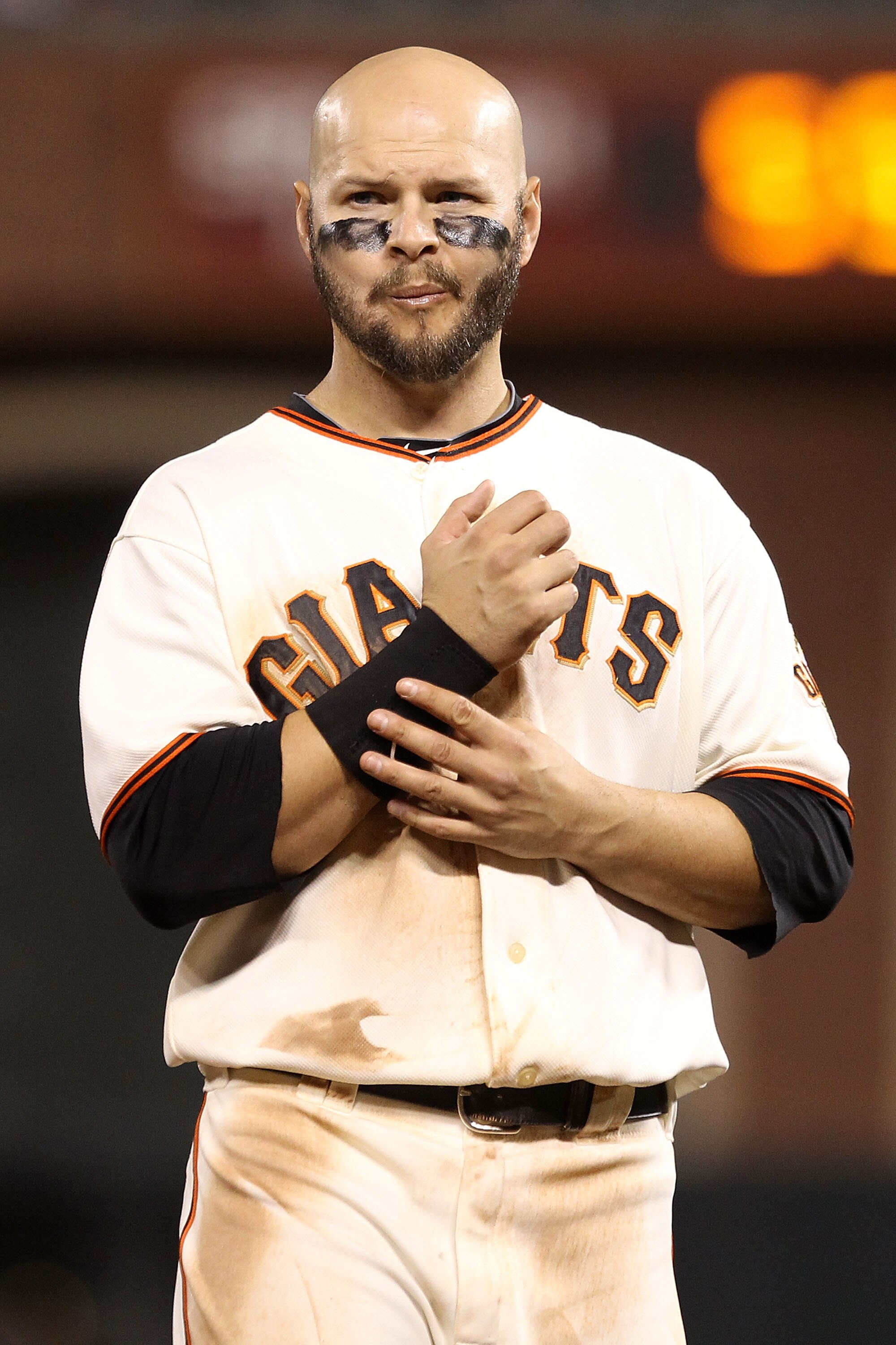 SAN FRANCISCO - OCTOBER 21:  Cody Ross #13 of the San Francisco Giants reacts after striking out in the eighth inning while taking on the Philadelphia Phillies in Game Five of the NLCS during the 2010 MLB Playoffs at AT&T Park on October 21, 2010 in San F