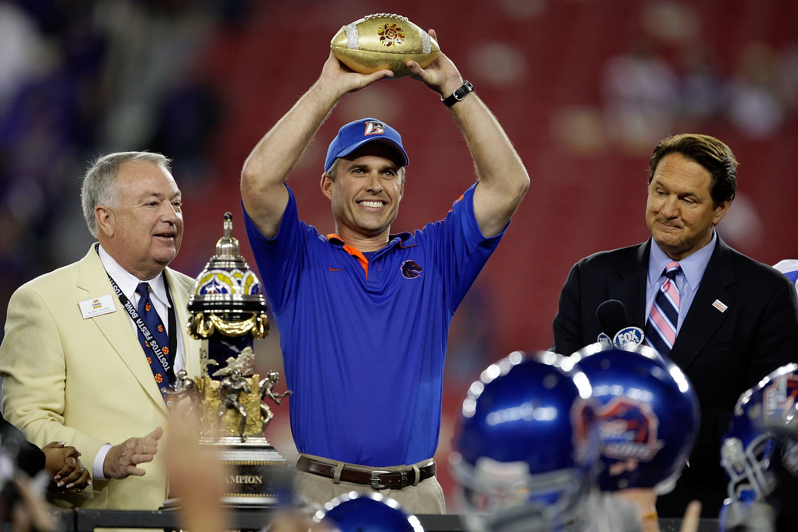GLENDALE, AZ - JANUARY 04:  Head coach Chris Petersen of the Boise State Broncos celebrates after defeating the TCU Horned Frogs 17-10 during the Tostitos Fiesta Bowl at the Universtity of Phoenix Stadium on January 4, 2010 in Glendale, Arizona.  (Photo b