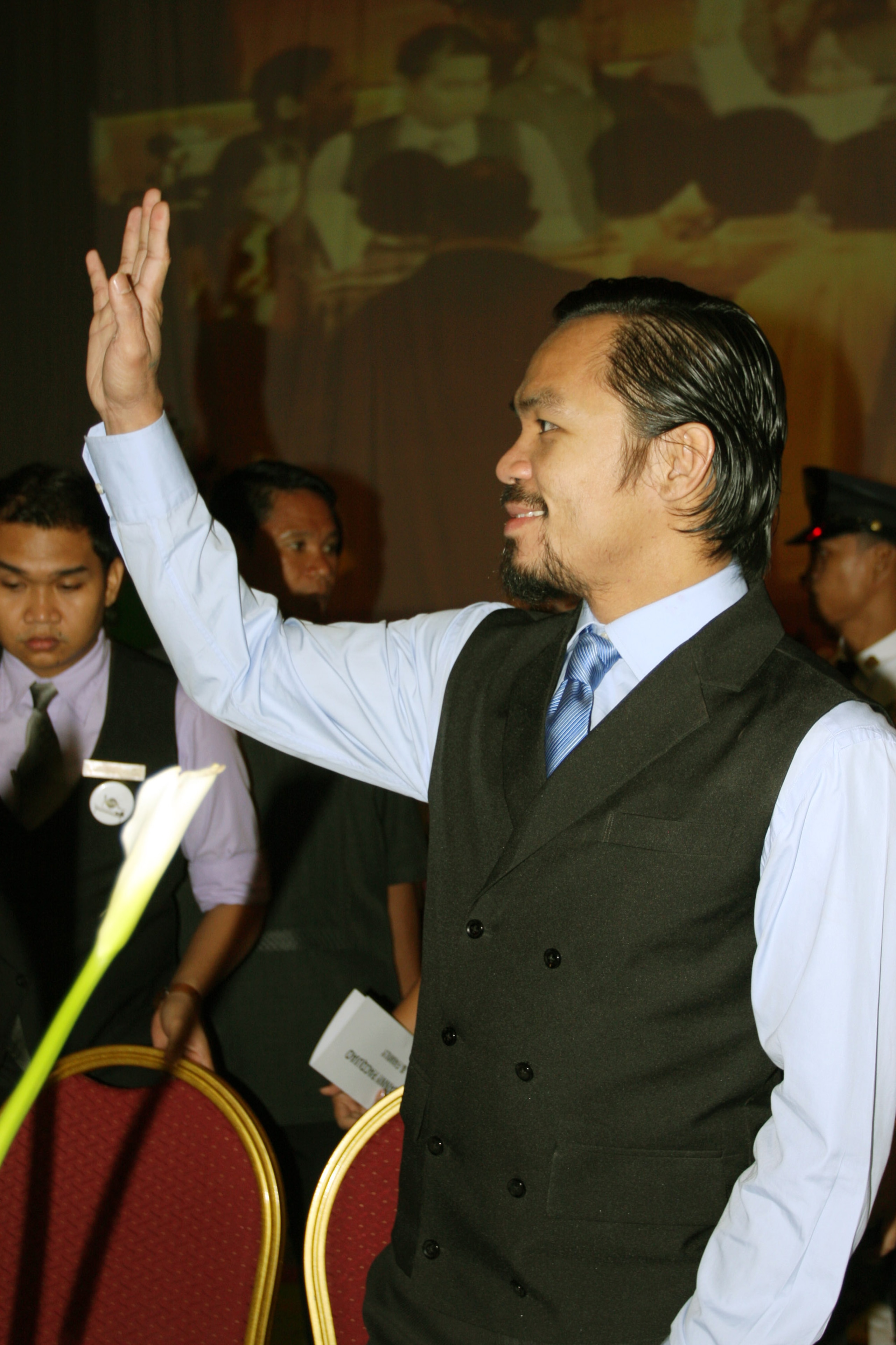 GENERAL SANTOS, PHILIPPINES - MAY 15:  World welterweight boxing champion Manny Pacquiao arrives at the KCC Mall on May 15, 2010 in General Santos, Philippines. Pacquiao was there to celebrate his election on becoming a member of House of Representatives
