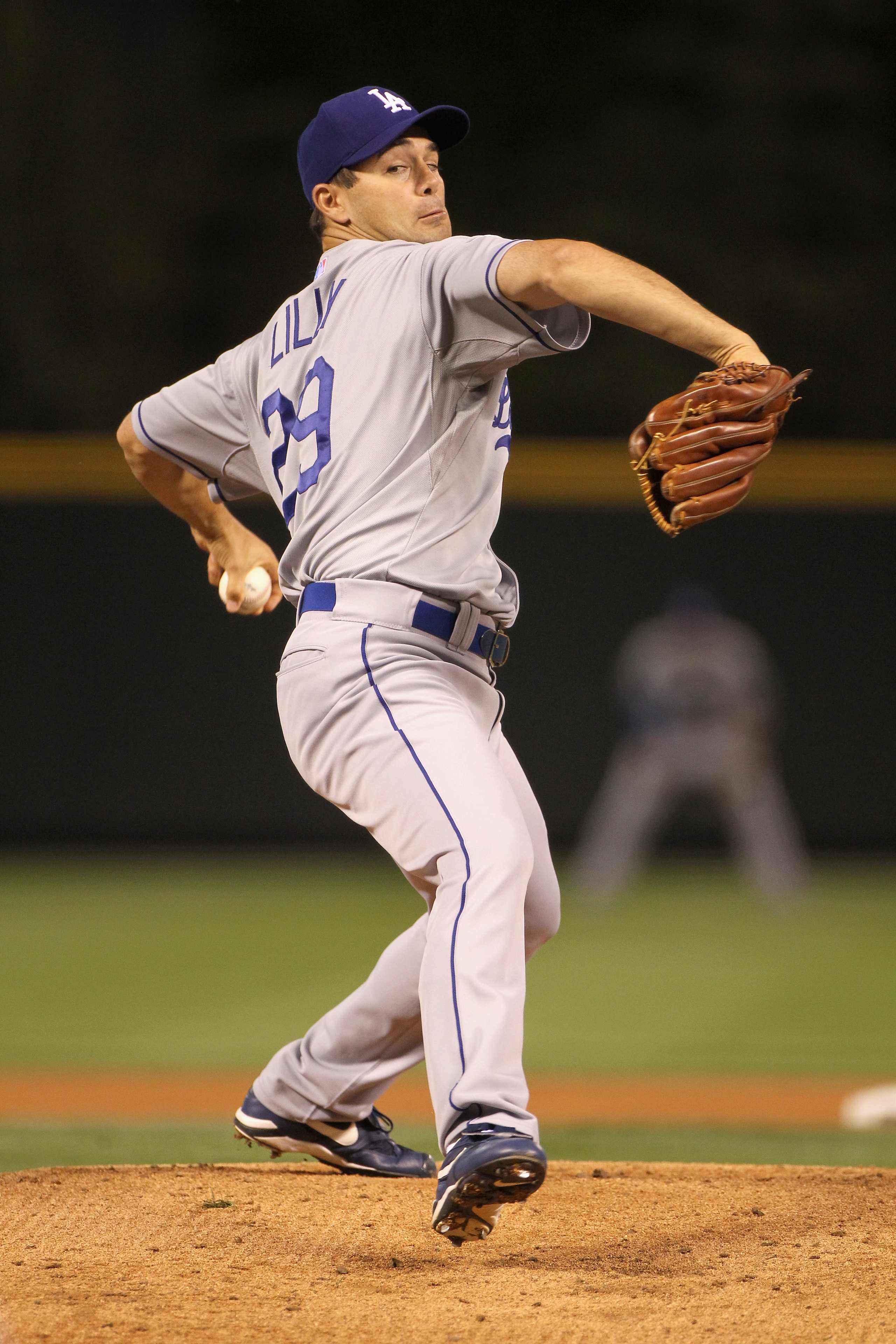 DENVER - SEPTEMBER 27: Starting pitcher Ted Lilly #29 of the Los Angeles Dodgers delivers against the Colorado Rockies at Coors Field on September 25, 2010 in Denver, Colorado. Lilly earned the win as the Dodgers defeated the Rockies 3-1. (Photo by Doug DENVER - SEPTEMBER 27: Starting pitcher Ted Lilly #29 of the Los Angeles Dodgers delivers against the Colorado Rockies at Coors Field on September 25, 2010 in Denver, Colorado. Lilly earned the win as the Dodgers defeated the Rockies 3-1. (Photo by Doug