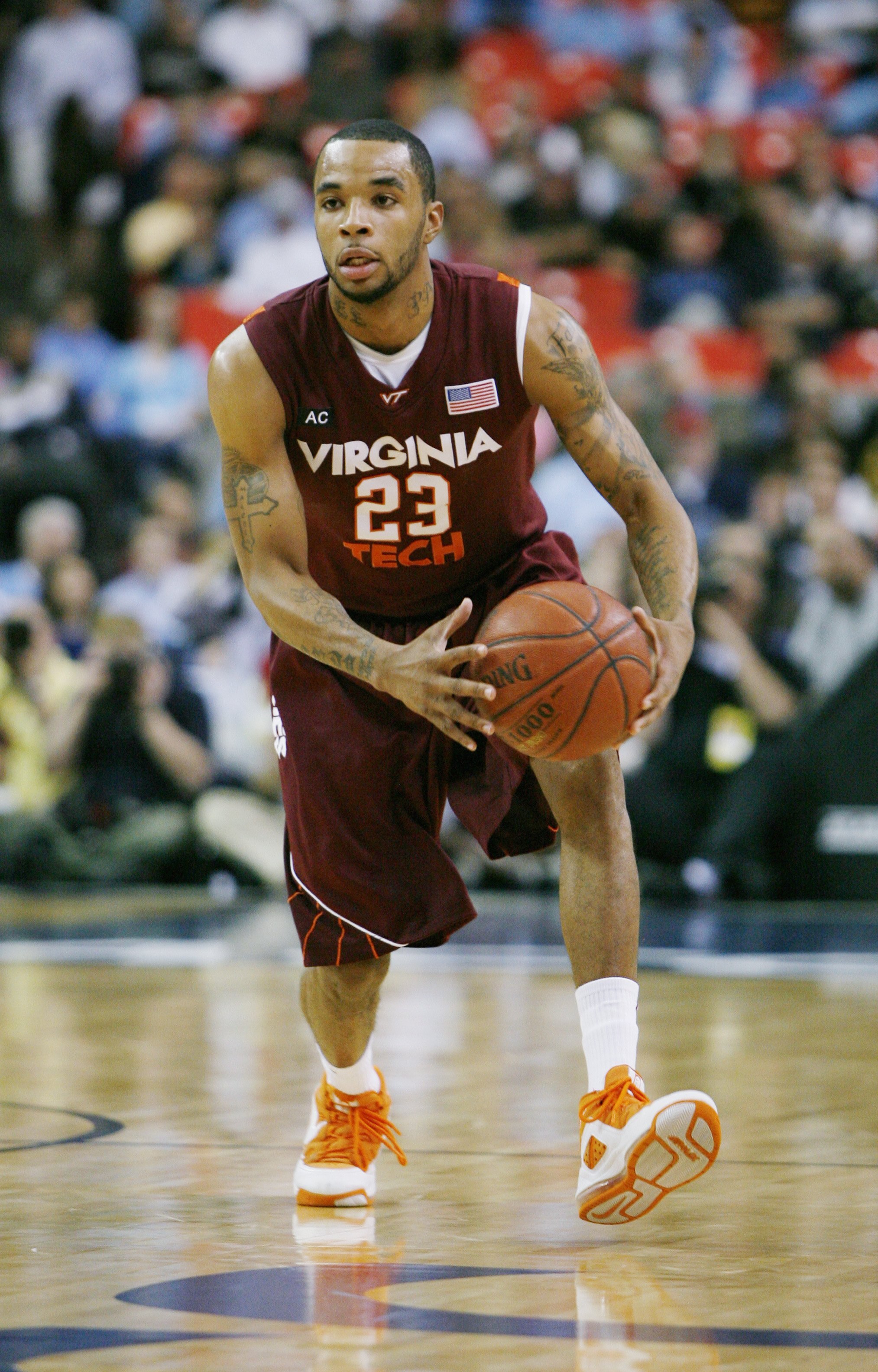 ATLANTA - MARCH 13:  Malcolm Delaney #23 of the Virginia Tech Hokies drives up court against the North Carolina Tar Heels during day two of the 2009 ACC Men's Basketball Tournament on March 13, 2009 at the Georgia Dome in Atlanta, Georgia.  (Photo by Kevi