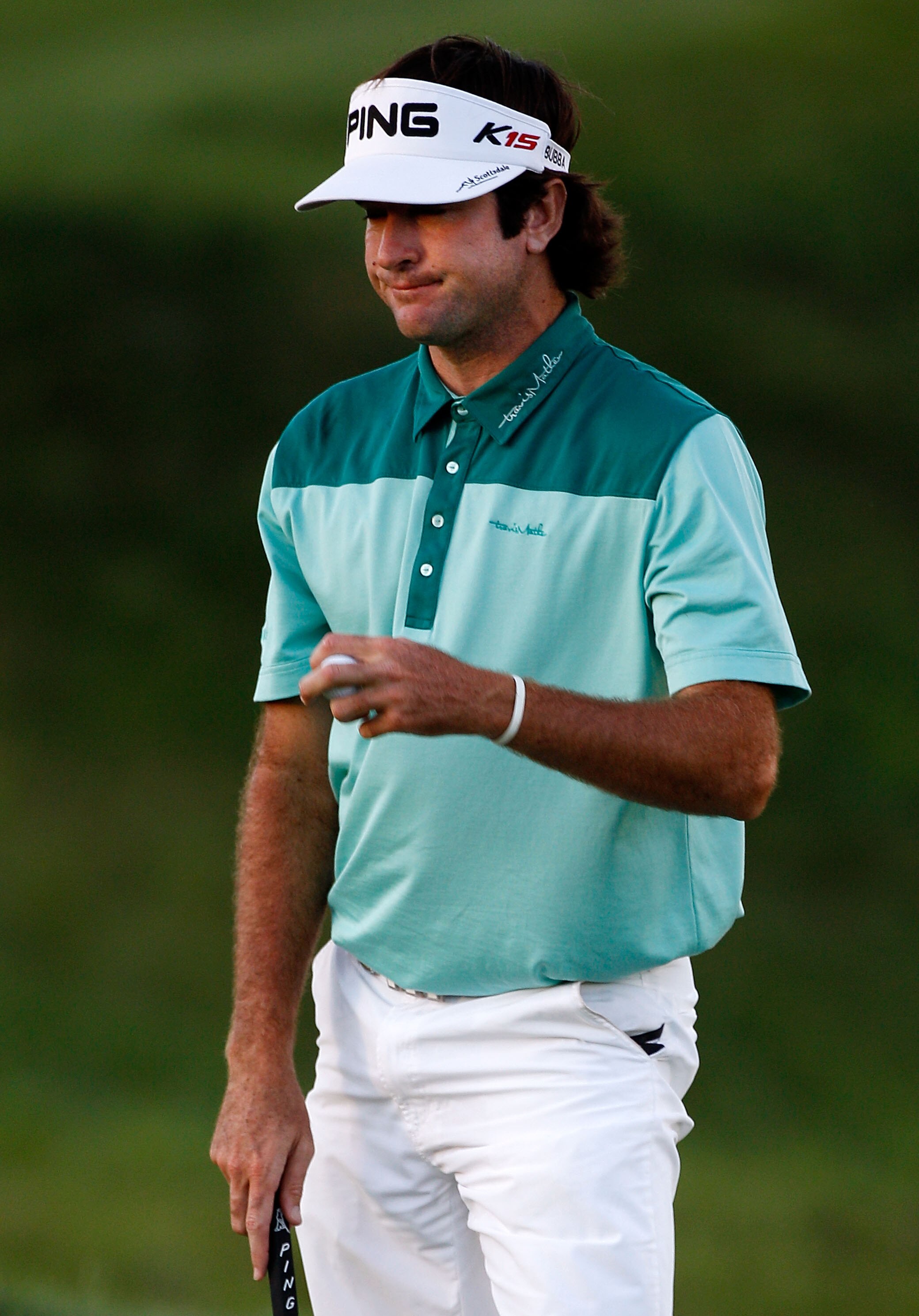 KOHLER, WI - AUGUST 15:  Bubba Watson walks across the 18th green during the three-hole aggregate playoff following the final round of the 92nd PGA Championship on the Straits Course at Whistling Straits on August 15, 2010 in Kohler, Wisconsin.  (Photo by