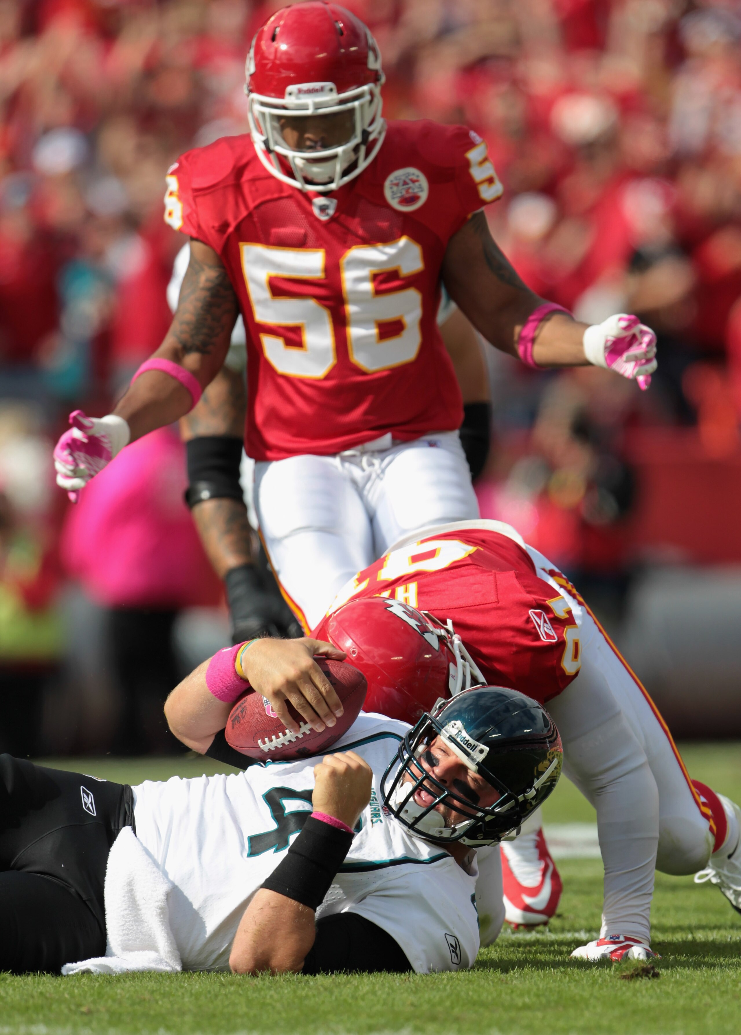 KANSAS CITY, MO - OCTOBER 24:  Quarterback Todd Bauman #4 of the Jacksonville Jaguars is sacked by Tamba Hali #91 of the Kansas City Chiefs during the game on October 24, 2010 at Arrowhead Stadium in Kansas City, Missouri.  (Photo by Jamie Squire/Getty Im