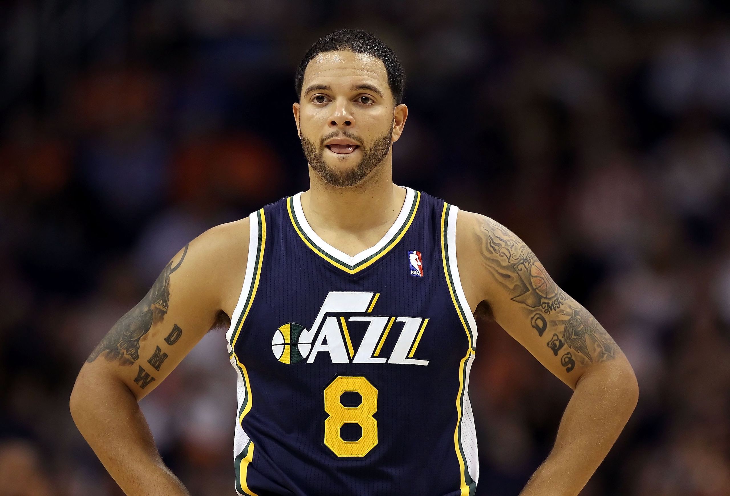 PHOENIX - OCTOBER 12: Deron Williams #8 of the Utah Jazz in action during the preseason NBA game against the Phoenix Suns at US Airways Center on October 12, 2010 in Phoenix, Arizona. NOTE TO USER: User expressly acknowledges and agrees that, by download PHOENIX - OCTOBER 12: Deron Williams #8 of the Utah Jazz in action during the preseason NBA game against the Phoenix Suns at US Airways Center on October 12, 2010 in Phoenix, Arizona. NOTE TO USER: User expressly acknowledges and agrees that, by download