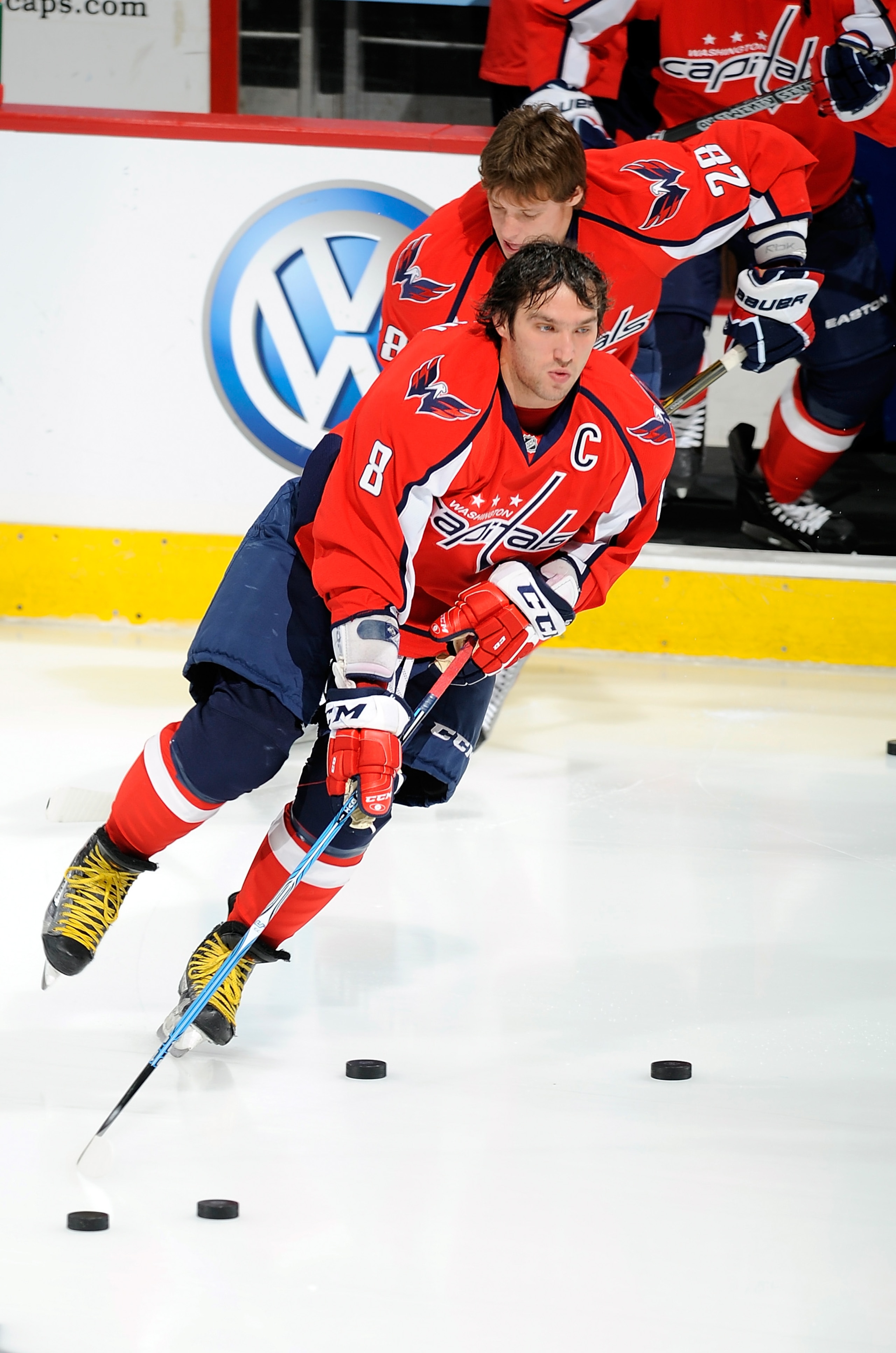 WASHINGTON - OCTOBER 19:  Alex Ovechkin #8 and Alexander Semin #28 of the Washington Capitals skate onto the ice before the game against the Boston Bruins at the Verizon Center on October 19, 2010 in Washington, DC.  (Photo by Greg Fiume/Getty Images)
