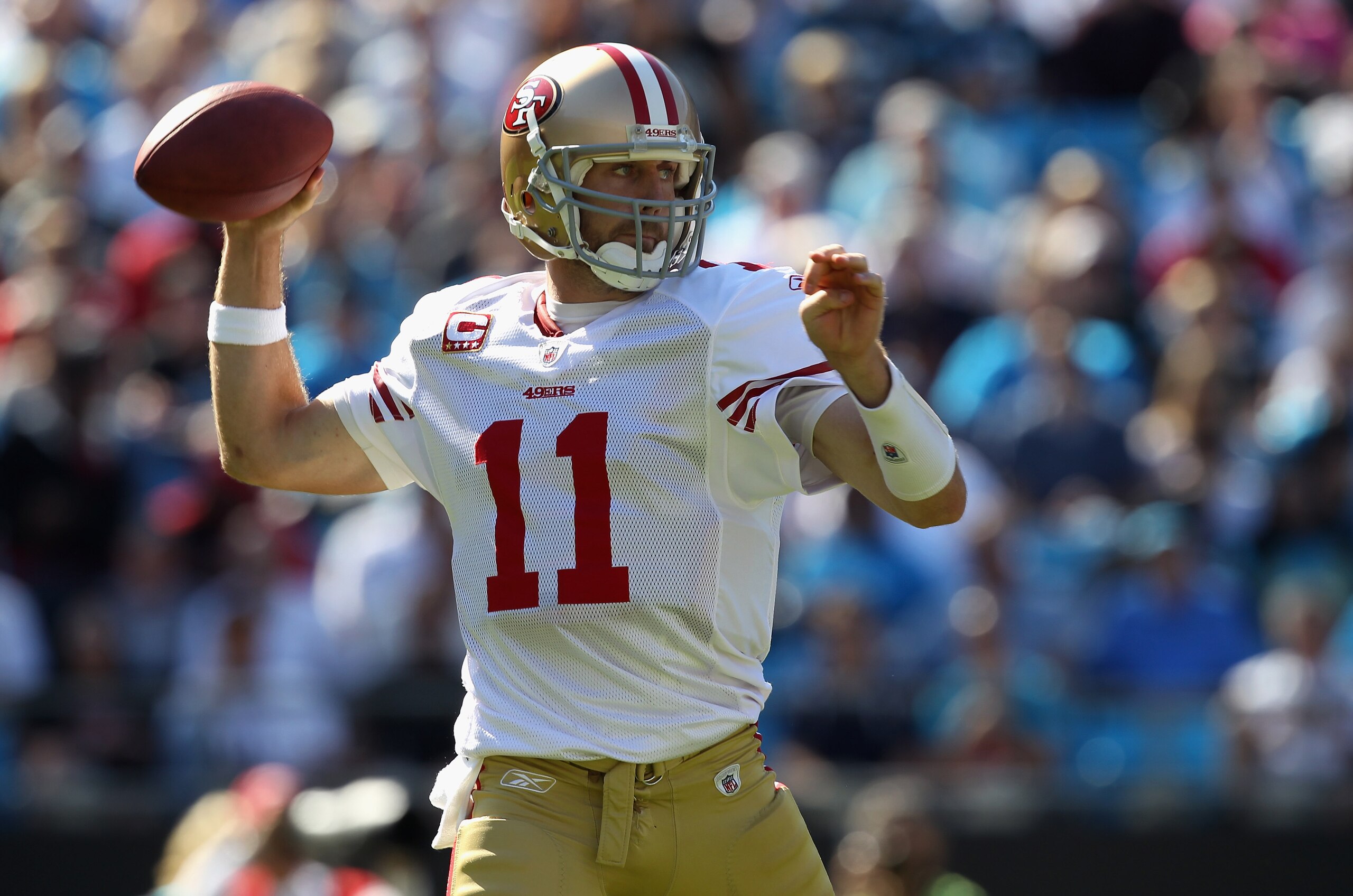 CHARLOTTE, NC - OCTOBER 24:  Alex Smith #11 of the San Francisco 49ers drops back to throw a pass against the Carolina Panthers during their game at Bank of America Stadium on October 24, 2010 in Charlotte, North Carolina.  (Photo by Streeter Lecka/Getty