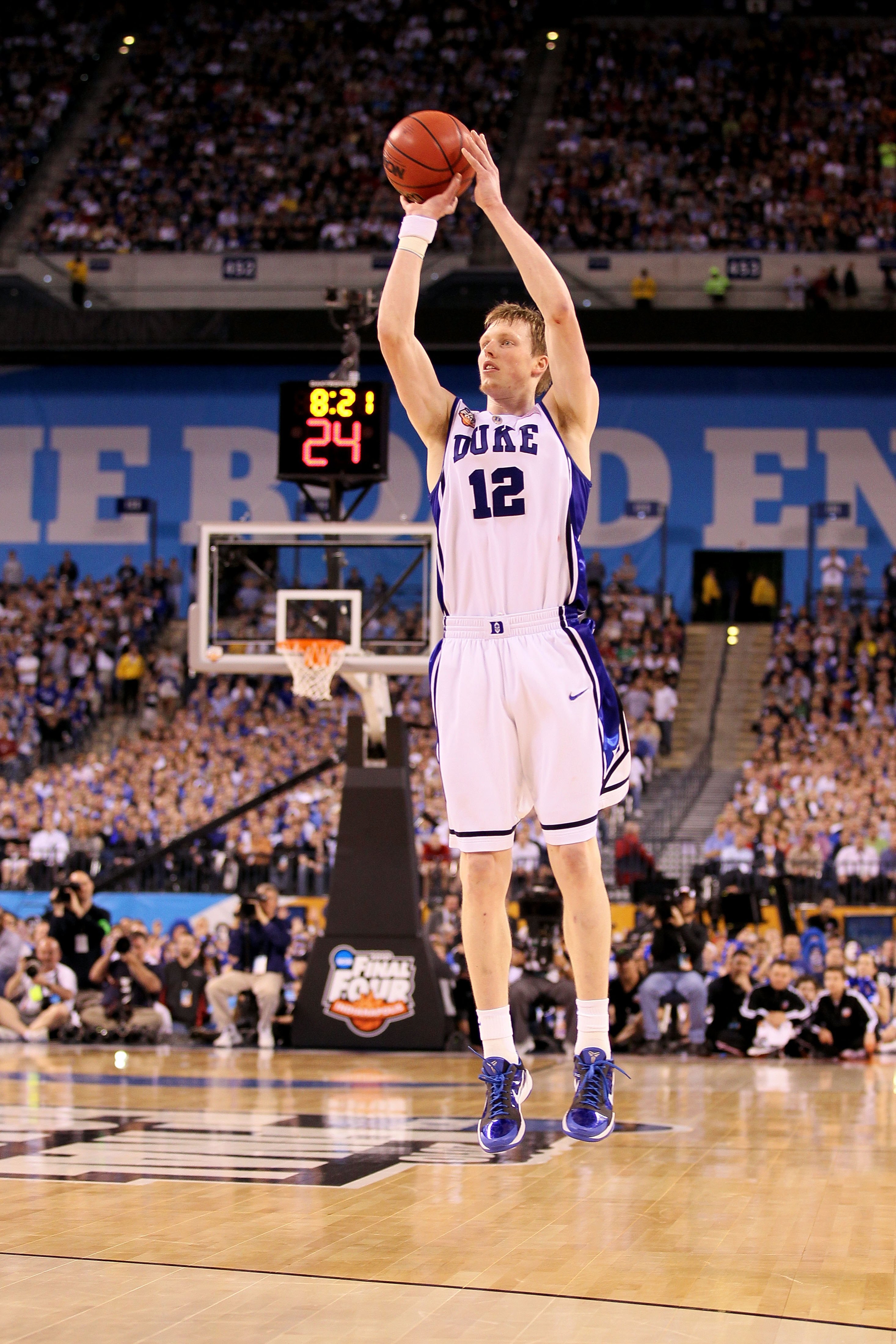 INDIANAPOLIS - APRIL 05:  Kyle Singler #12 of the Duke Blue Devils attempts a shot against the Butler Bulldogs during the 2010 NCAA Division I Men's Basketball National Championship game at Lucas Oil Stadium on April 5, 2010 in Indianapolis, Indiana. Duke