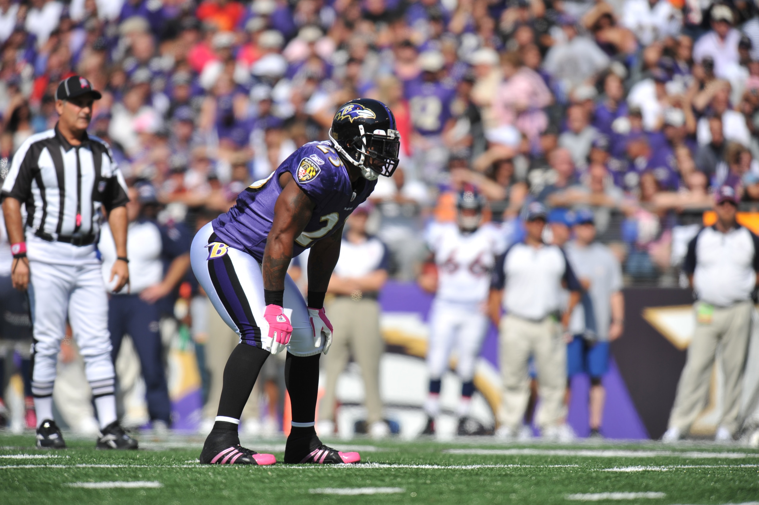 BALTIMORE, MD - OCTOBER 10: Willis McGahee #23 of the Baltimore Ravens prepares to run against the Denver Broncos at M&T Bank Stadium on October 10, 2010 in Baltimore, Maryland. Players wore pink in recognition of Breast Cancer Awareness Month. The Ravens