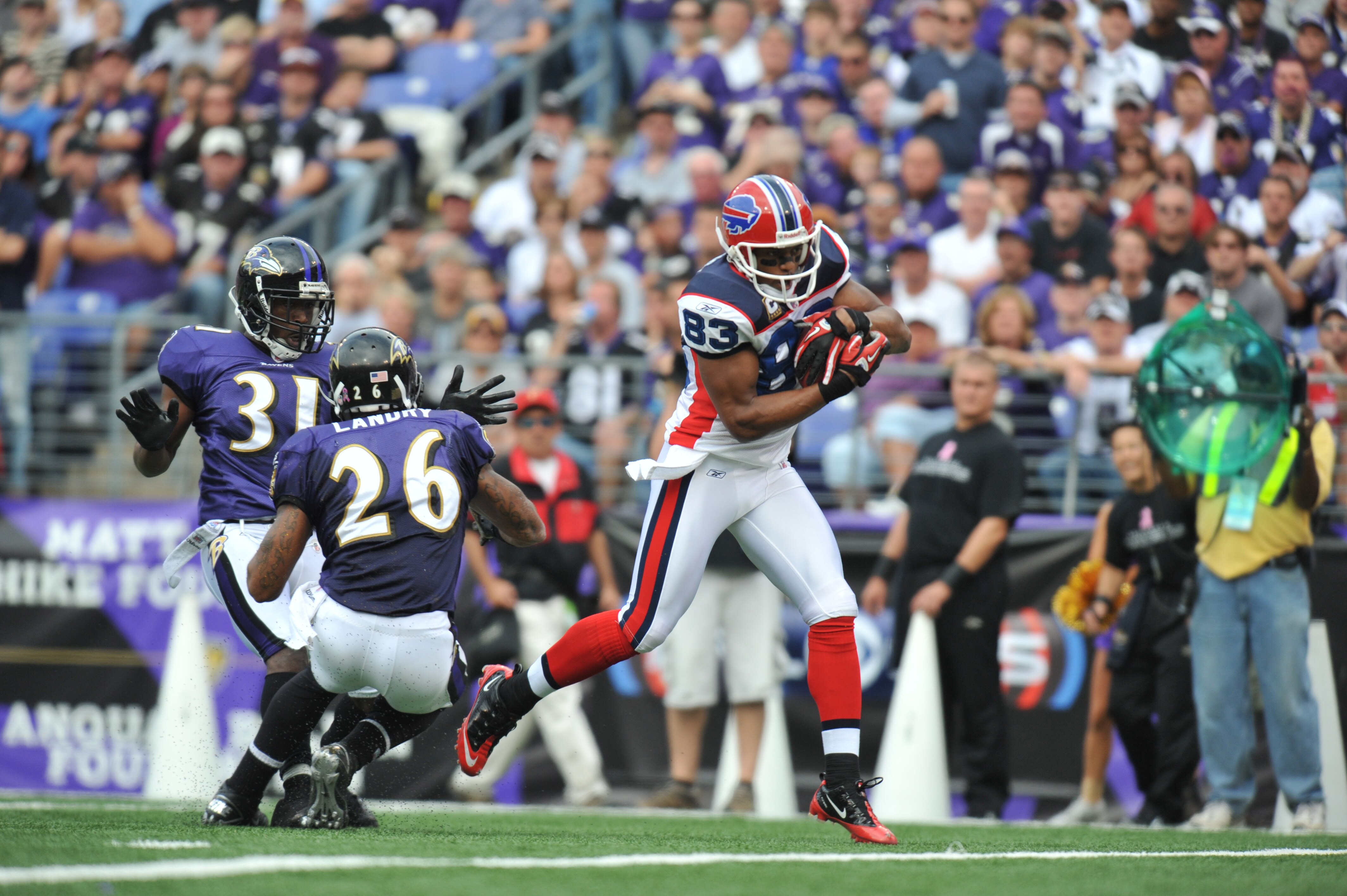 BALTIMORE, MD - OCTOBER 24:  Lee Evans #83 of the Buffalo Bills scores a touchdown against the Baltimore Ravens at M&T Bank Stadium on October 24, 2010 in Baltimore, Maryland. The Bills lead the Ravens at the half 24-20. (Photo by Larry French/Getty Image