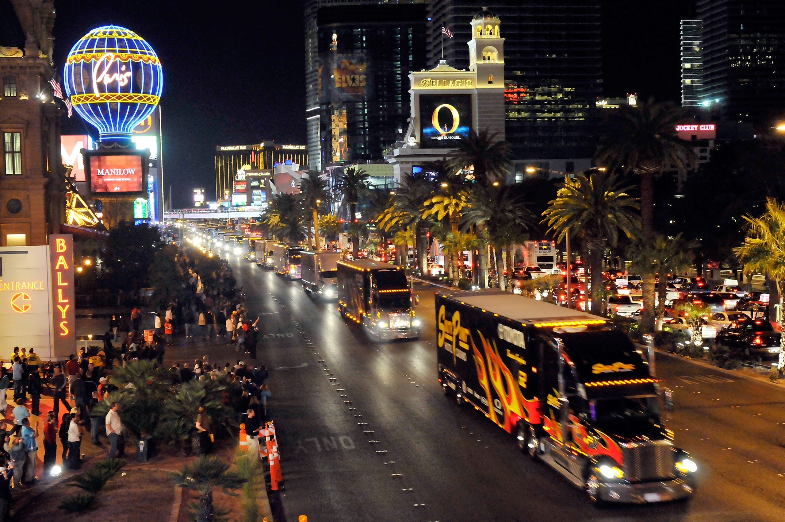 LAS VEGAS - FEBRUARY 25: NASCAR car haulers parade down the Las Vegas Strip Thursday, February 25, 2010 in Las Vegas, Nevada. Racers will compete in the 2010 Shelby American, the third race of the NASCAR Sprint Cup Series race at the Las Vegas Motor Spee LAS VEGAS - FEBRUARY 25: NASCAR car haulers parade down the Las Vegas Strip Thursday, February 25, 2010 in Las Vegas, Nevada. Racers will compete in the 2010 Shelby American, the third race of the NASCAR Sprint Cup Series race at the Las Vegas Motor Spee