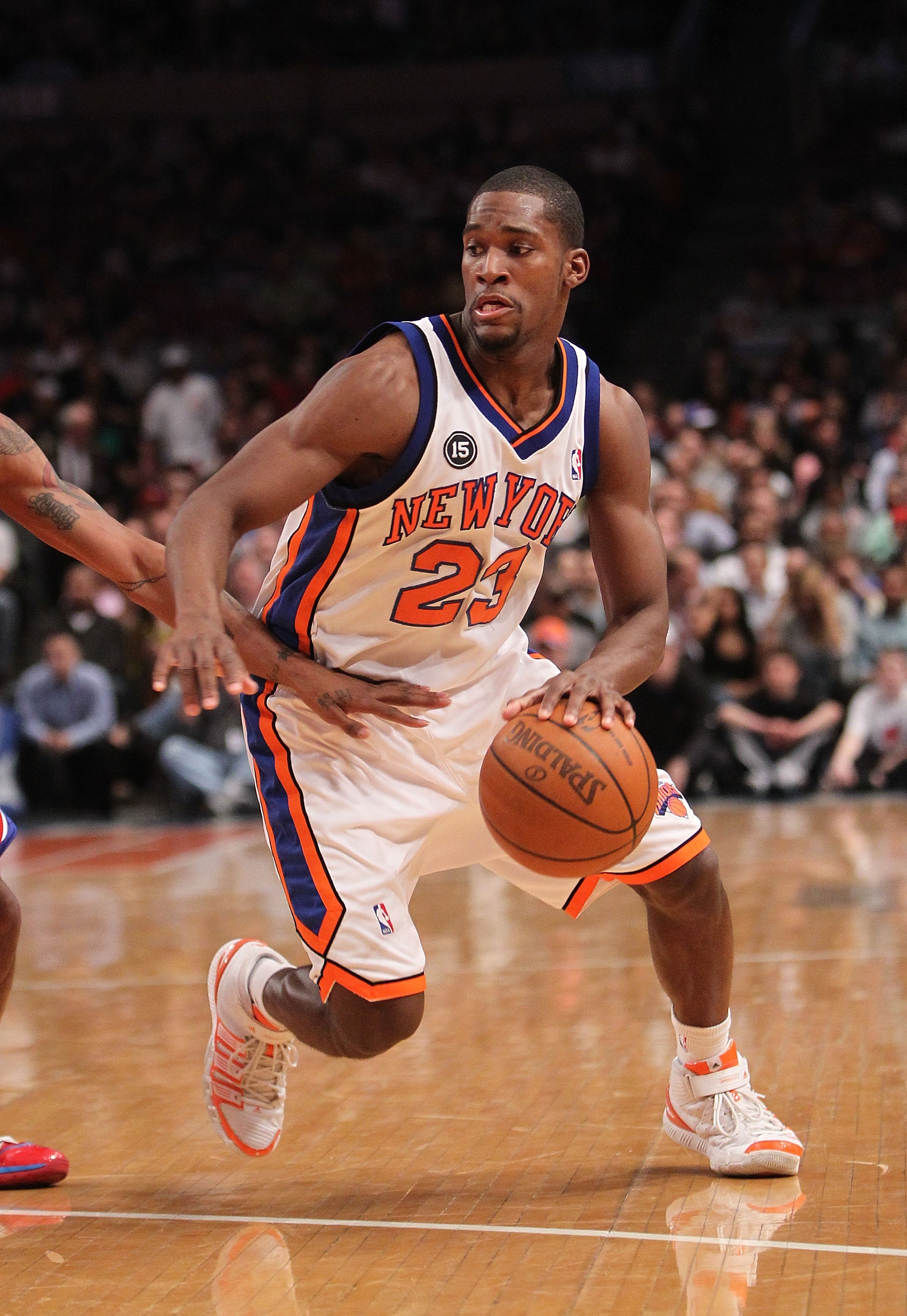 NEW YORK - MARCH 19:  Toney Douglas #23 of the New York Knicks against the Philadelphia 76ers at Madison Square Garden on March 19, 2010 in New York City. NOTE TO USER: User expressly acknowledges and agrees that, by downloading and or using this photogra