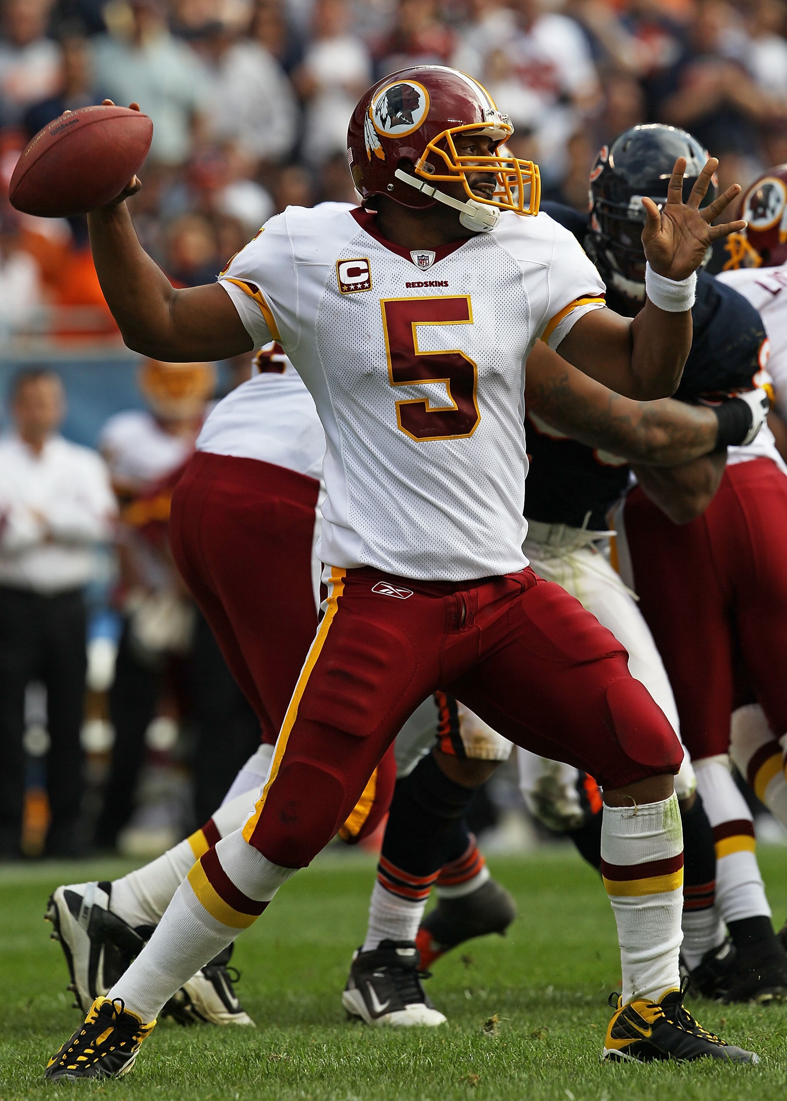 CHICAGO - OCTOBER 24: Donovan McNabb #5 of the Washington Redskins throws a pass against the Chicago Bears at Soldier Field on October 24, 2010 in Chicago, Illinois. The Redskins defeated the Bears 17-14. (Photo by Jonathan Daniel/Getty Images)