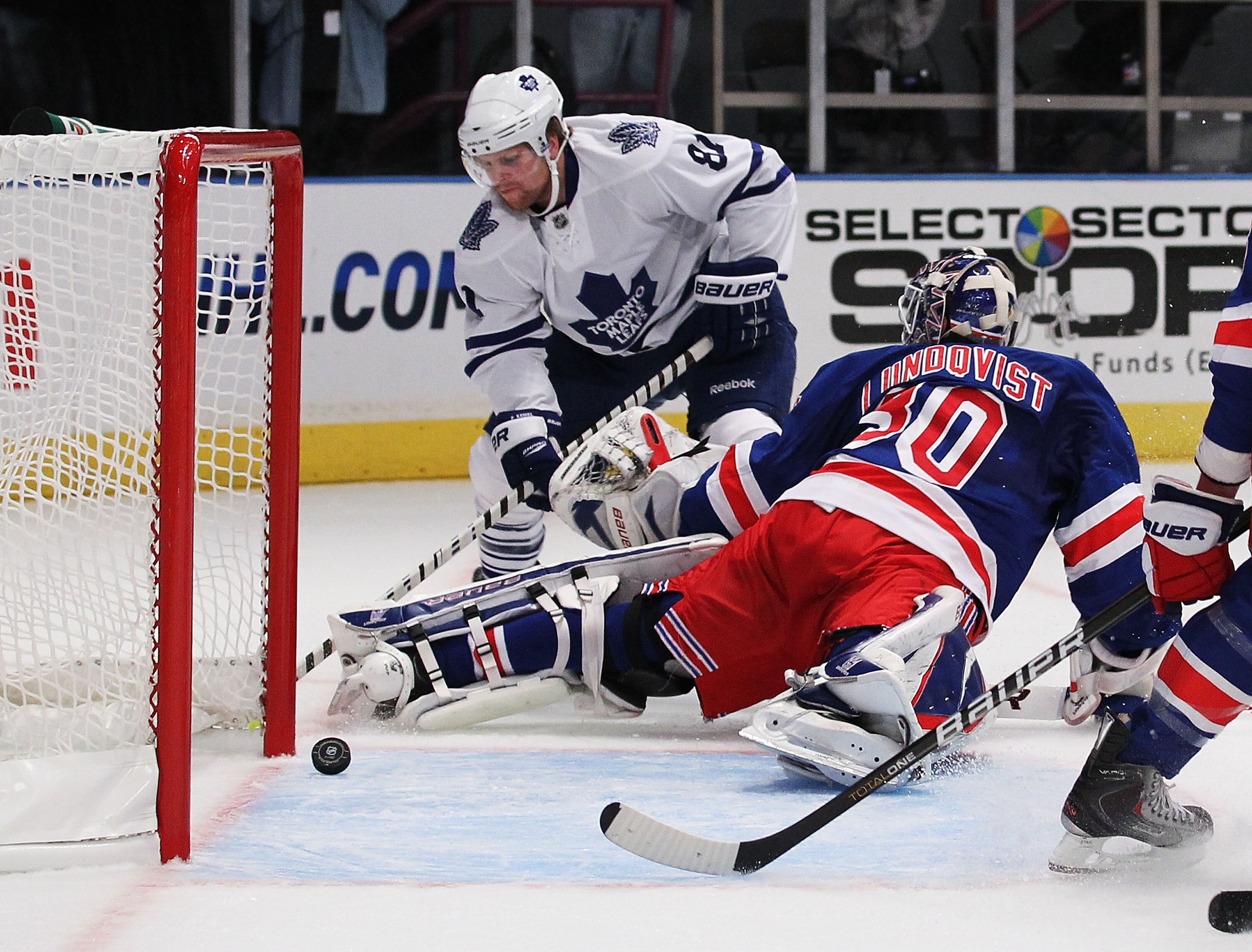NEW YORK - OCTOBER 15:  Henrik Lundqvist #30 of the New York Rangers makes a save against Phil Kessel #81 of the Toronto Maple Leafs during their game on October 15, 2010 at Madison Square Garden in New York City.  (Photo by Al Bello/Getty Images)