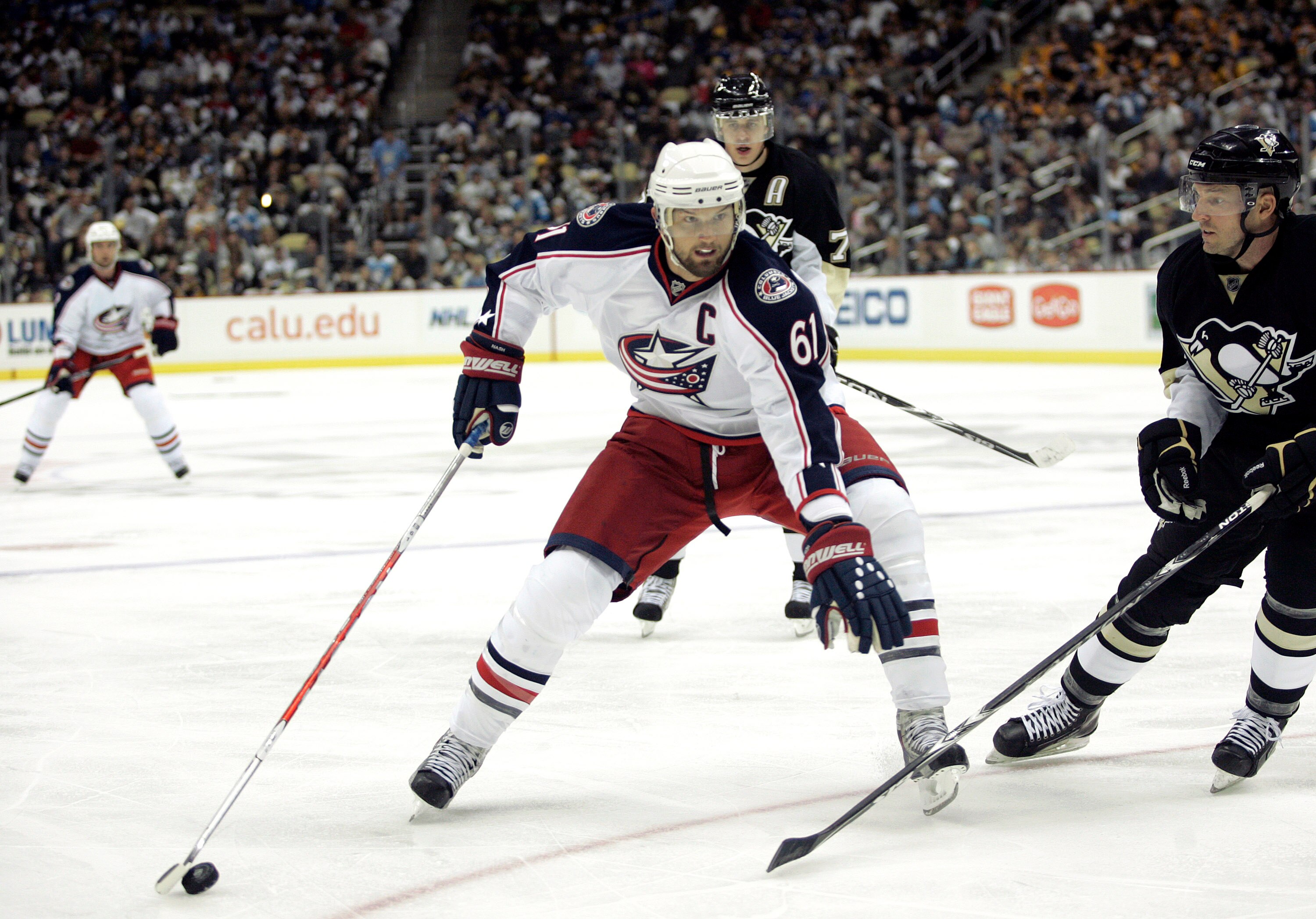 PITTSBURGH - SEPTEMBER 25:  Rick Nash #61of the Columbus Blue Jackets handles the puck against the Pittsburgh Penguins at Consol Energy Center on September 25, 2010 in Pittsburgh, Pennsylvania.  (Photo by Justin K. Aller/Getty Images)