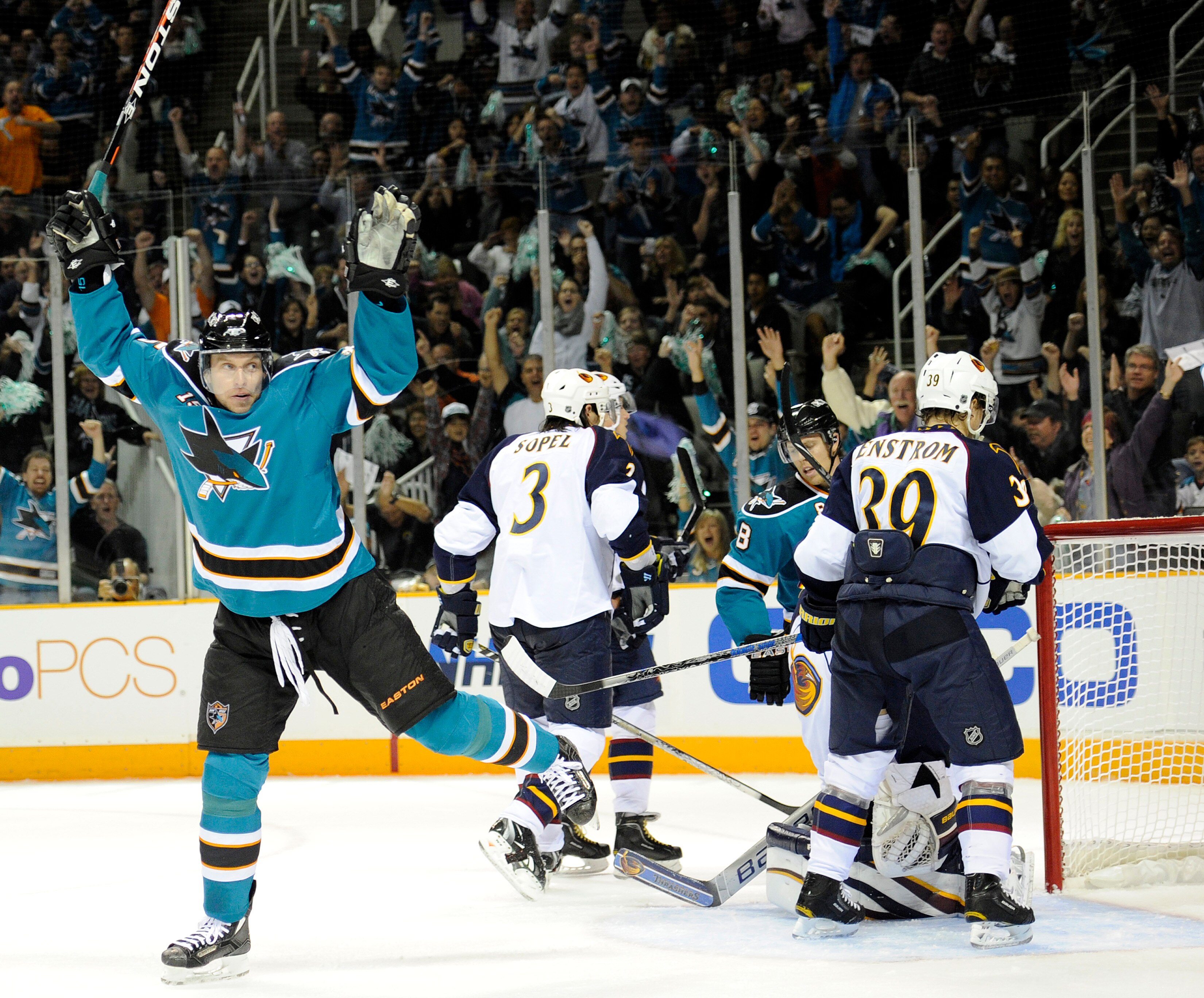 SAN JOSE, CA - OCTOBER 16: Dany Heatley #15 of of the San Jose Sharks throws his hand in the air after scoring his 300th career goal  against the Atlanta Thrashers at the HP Pavilion October 16, 2010 in San Jose, California. (Photo by Thearon W. Henderson