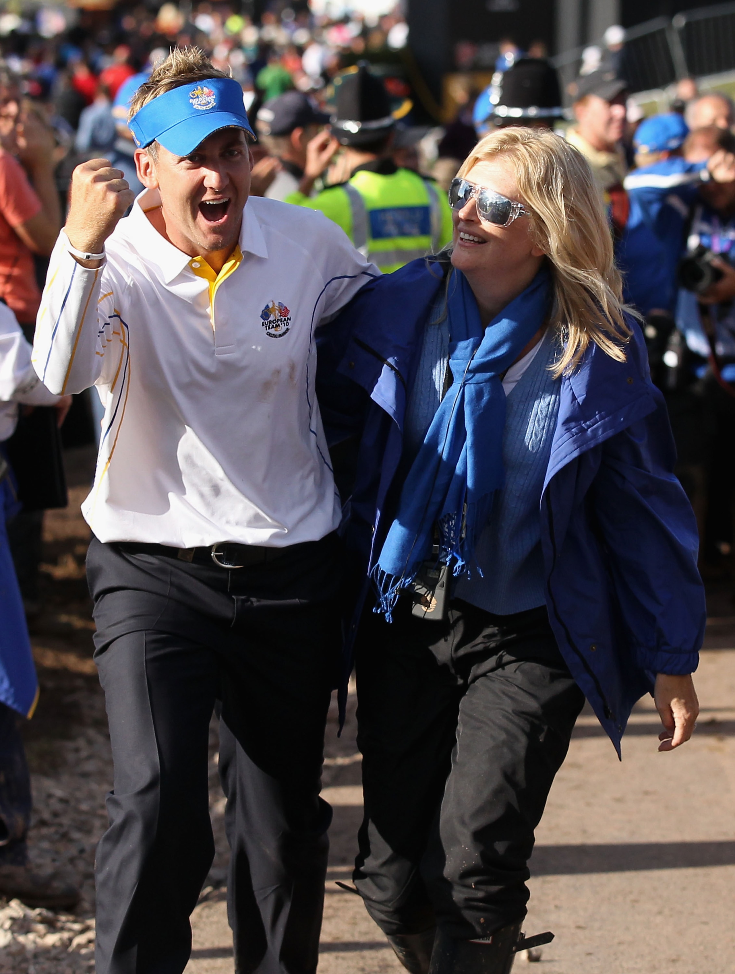 NEWPORT, WALES - OCTOBER 04:  European Team member Ian Poulter (L) walks with his wife Katie Poulter following Europe's 14.5 to 13.5 victory over the USA at the 2010 Ryder Cup at the Celtic Manor Resort on October 4, 2010 in Newport, Wales.  (Photo by Dav