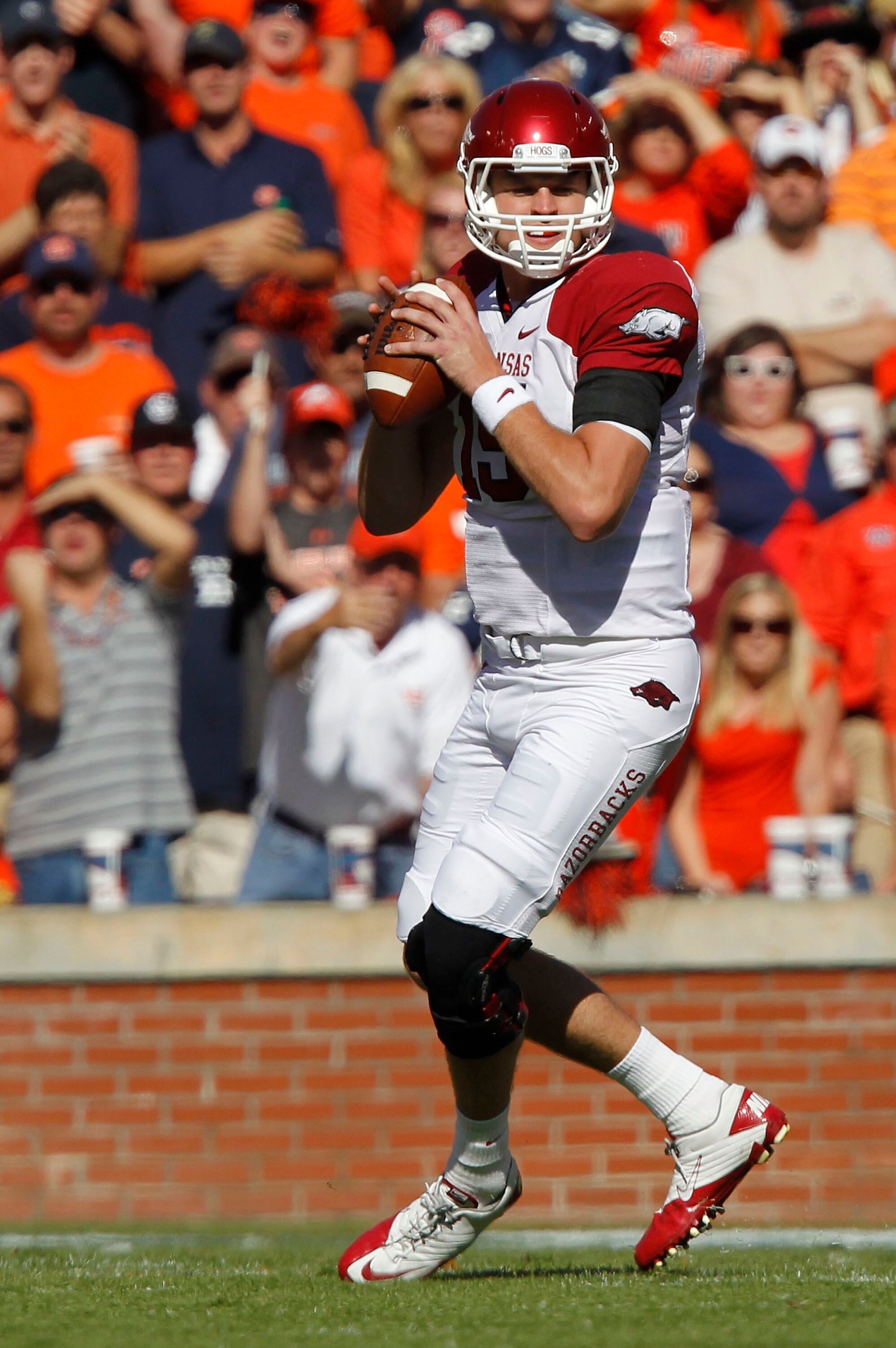 AUBURN, AL - OCTOBER 16: Quarterback Ryan Mallett #15 of the Arkansas Razorbacks drops back and looks downfield for receiver during the game against the Auburn Tigers at Jordan-Hare Stadium on October 16, 2010 in Auburn, Alabama. The Tigers beat the Raz AUBURN, AL - OCTOBER 16: Quarterback Ryan Mallett #15 of the Arkansas Razorbacks drops back and looks downfield for receiver during the game against the Auburn Tigers at Jordan-Hare Stadium on October 16, 2010 in Auburn, Alabama. The Tigers beat the Raz