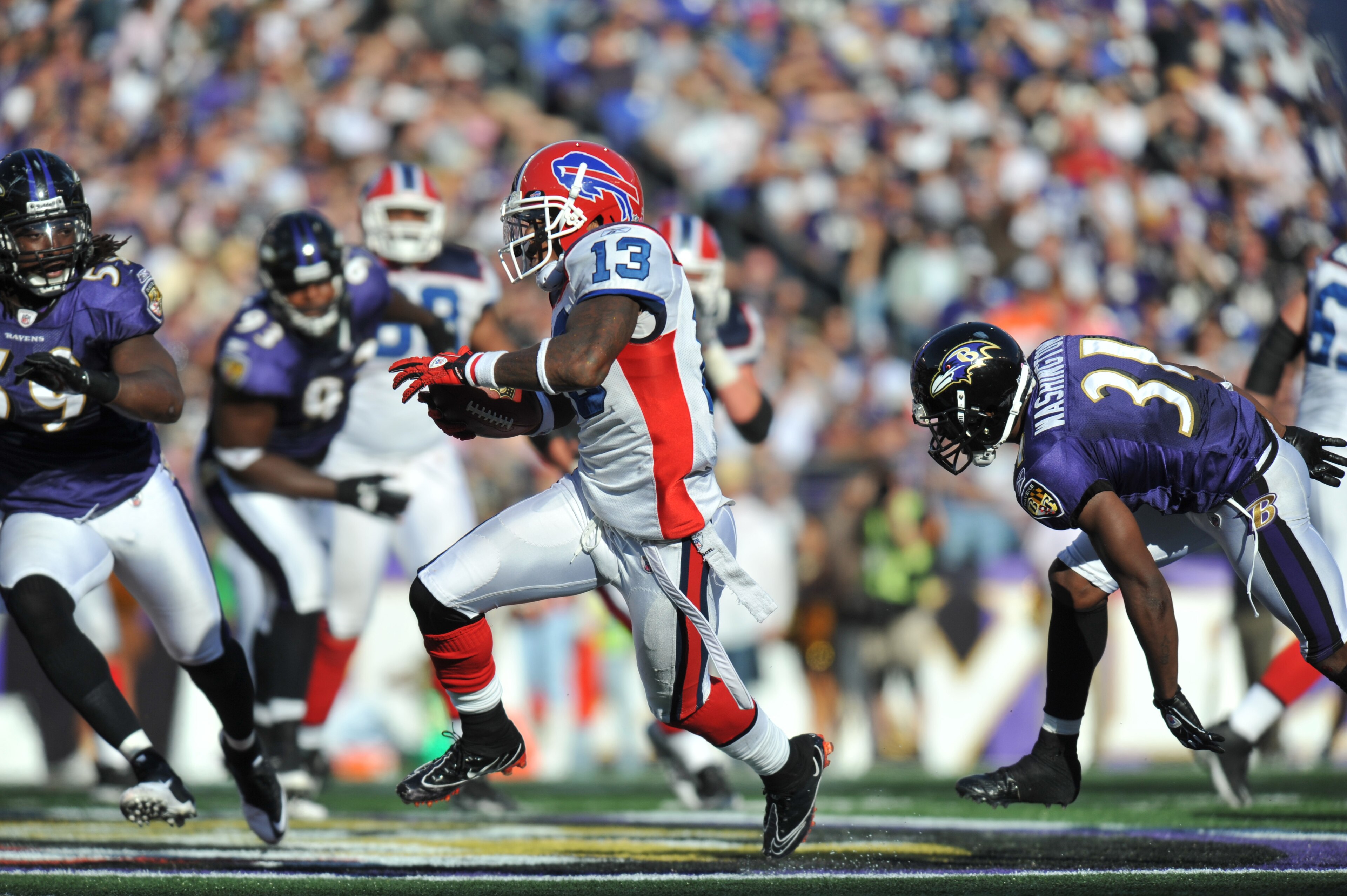 BALTIMORE, MD - OCTOBER 24:  Steve Johnson #13 of the Buffalo Bills runs the ball against the Baltimore Ravens at M&T Bank Stadium on October 24, 2010 in Baltimore, Maryland. The Ravens defeated the Bills 37-34. (Photo by Larry French/Getty Images)