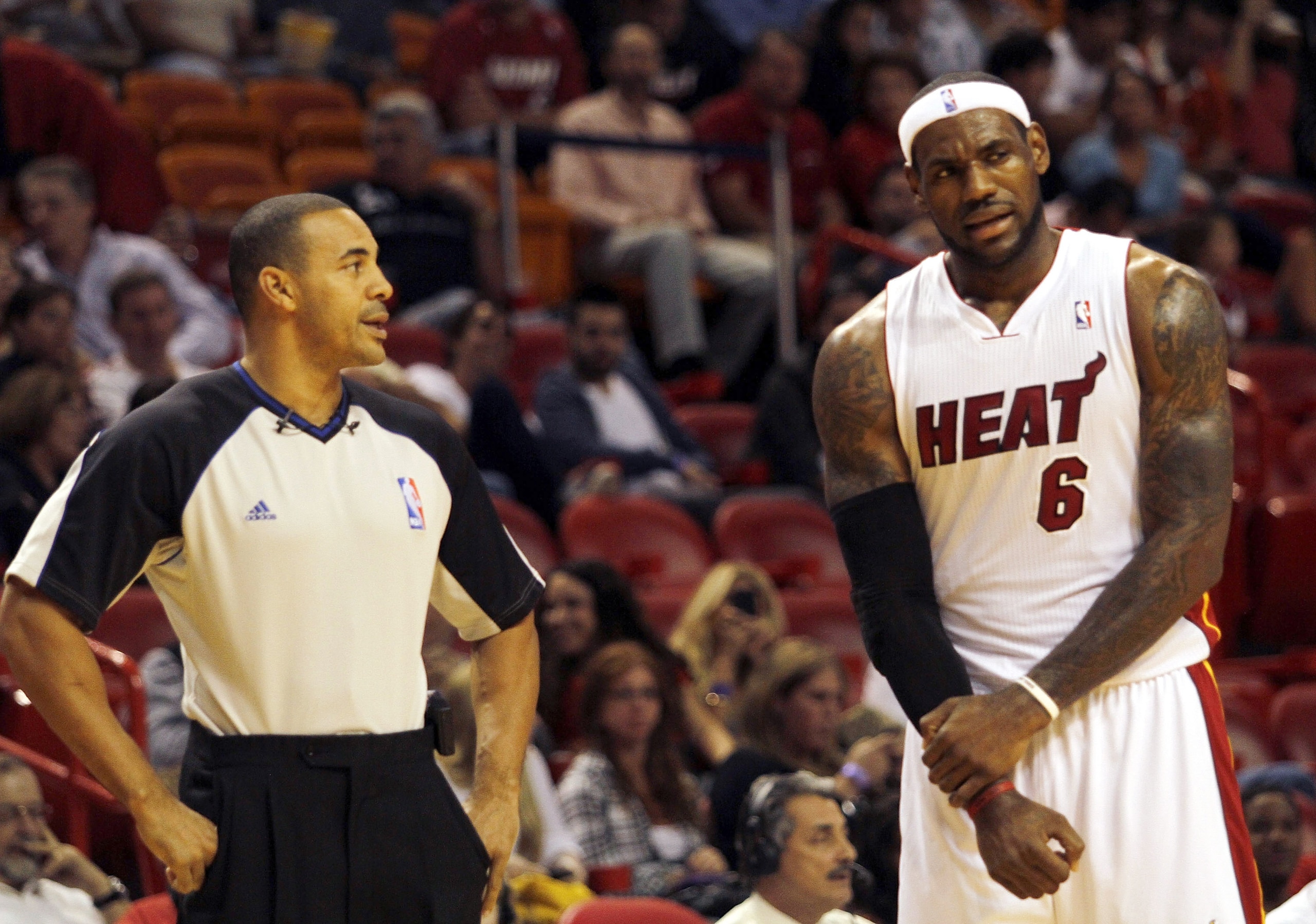 MIAMI - OCTOBER 18:  Forward LeBron James #6 argues a call with the referee while playing against the Charlotte Bobcats on October 18, 2010 at American Airlines Arena in Miami, Florida. NOTE TO USER: User expressly acknowledges and agrees that, by downloa