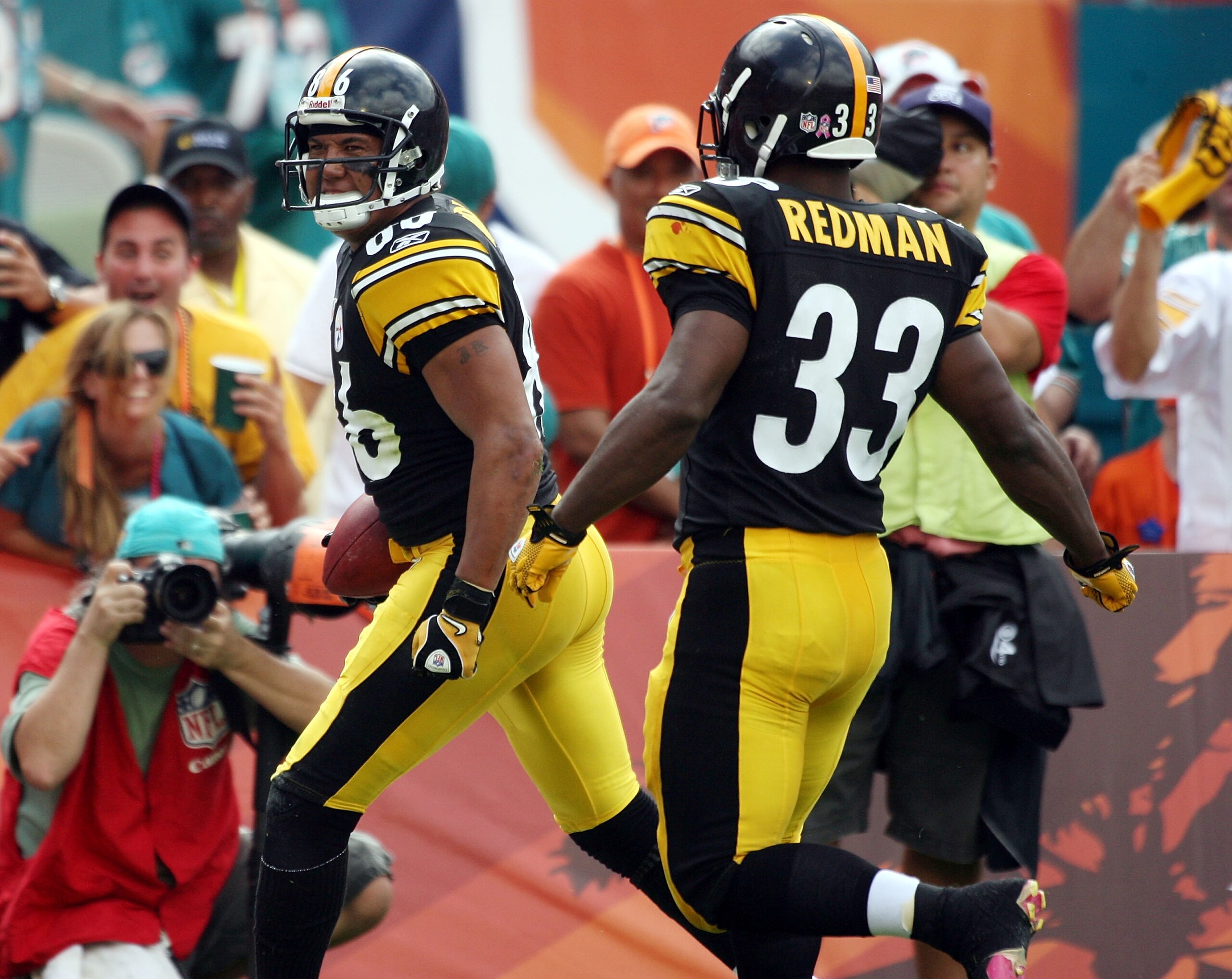MIAMI - OCTOBER 24:  Receiver Hines Ward #86  celebrates a touchdown against the Miami Dolphins with teammate Isaac Redman #33 at Sun Life Stadium on October 24, 2010 in Miami, Florida.  (Photo by Marc Serota/Getty Images)