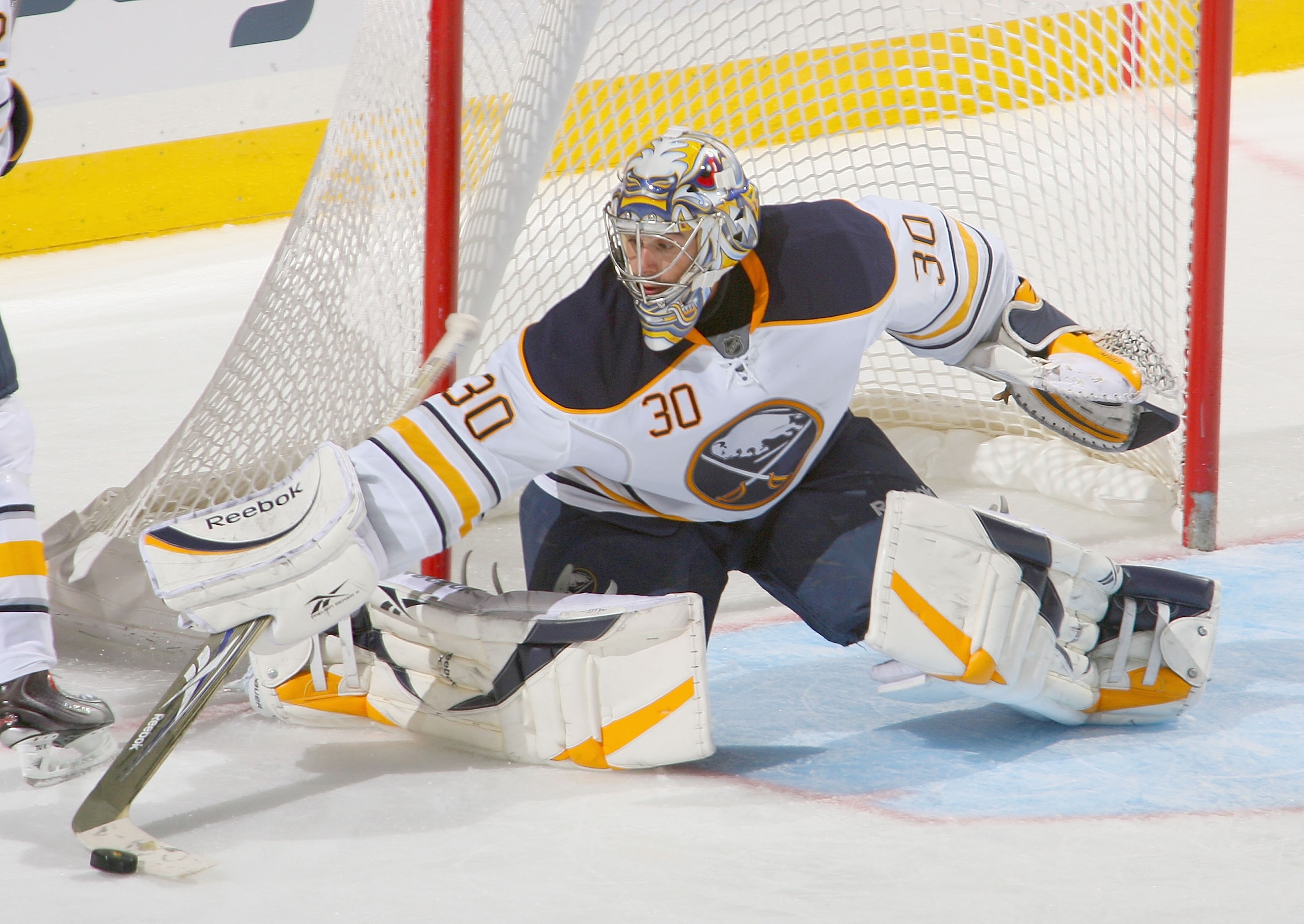 BUFFALO, NY - OCTOBER 15:  Ryan Miller #30 of the Buffalo Sabres deflects the puck  against the Montreal Canadiens at HSBC Arena on October 15, 2010 in Buffalo, New York. Montreal won 2-1. (Photo by Rick Stewart/Getty Images)