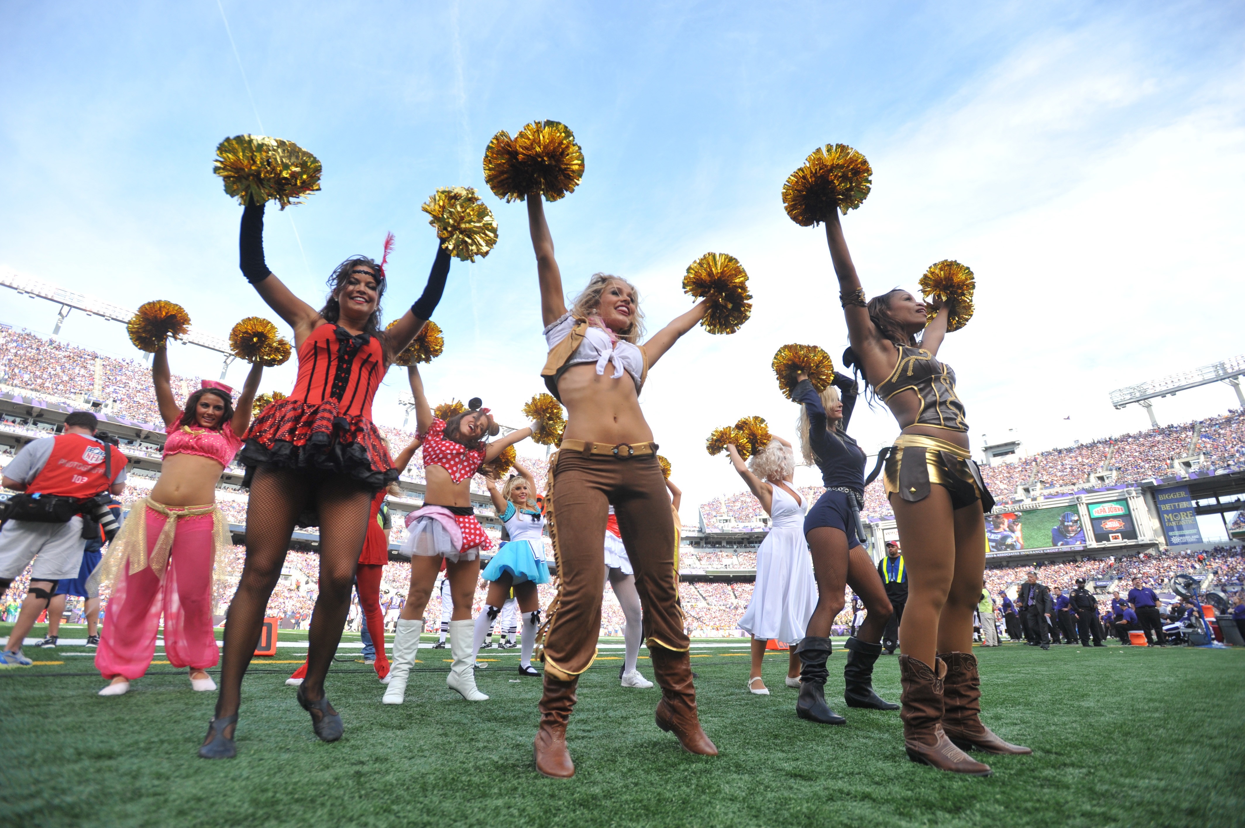 BALTIMORE, MD - OCTOBER 24:  Cheerleaders for the Baltimore Ravens cheer during the game against the Buffalo Bills at M&T Bank Stadium on October 24, 2010 in Baltimore, Maryland. The Ravens defeated the Bills 37-34. (Photo by Larry French/Getty Images)