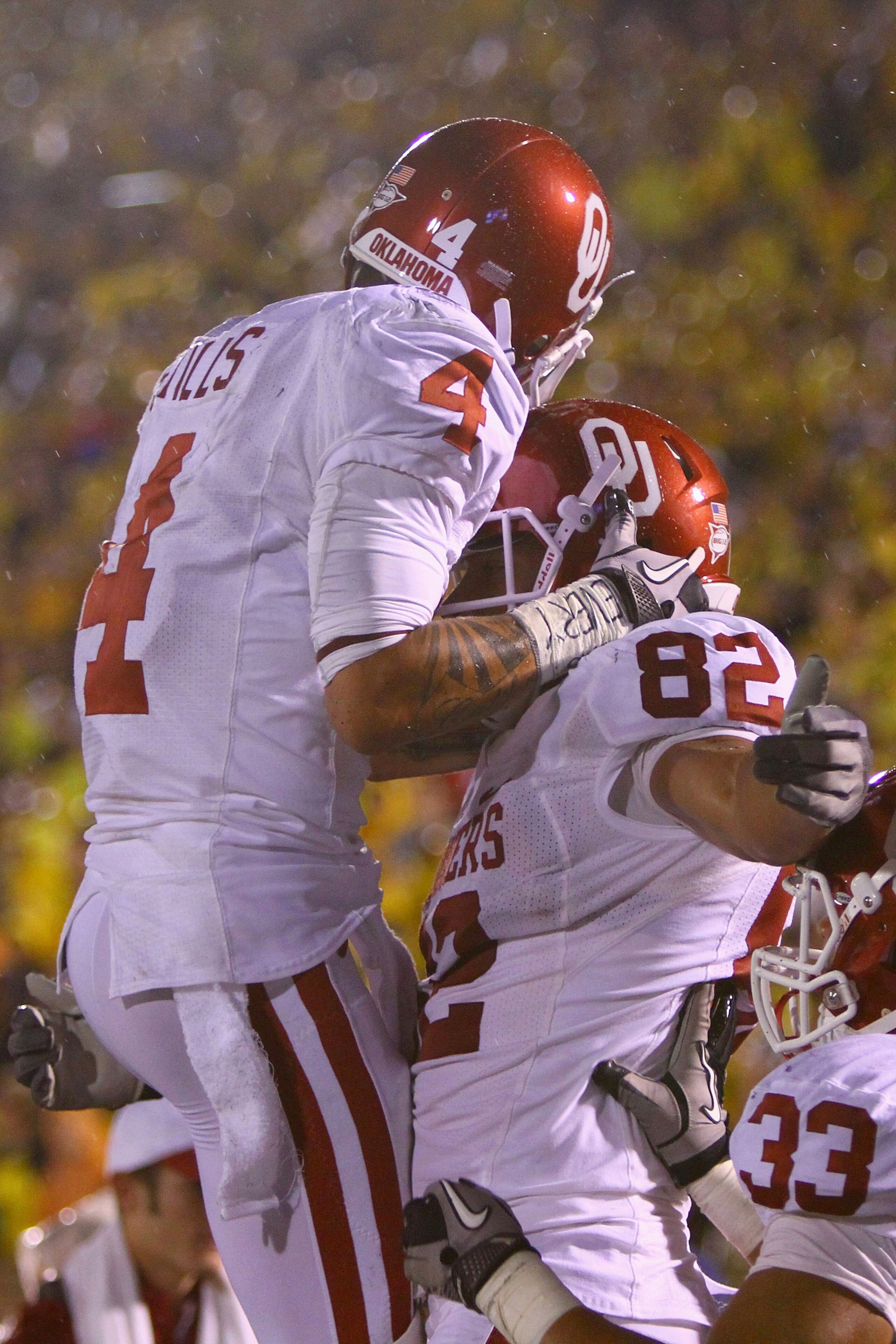 COLUMBIA, MISSOURI - OCTOBER 23: James Hanna #82 and Kenny Stills #4 both of the Oklahoma Sooners celebrate Hanna's touchdown against the Missouri Tigers Faurot Field/Memorial Stadium on October 23, 2010 in Columbia, Missouri.  The Tigers beat the Sooners