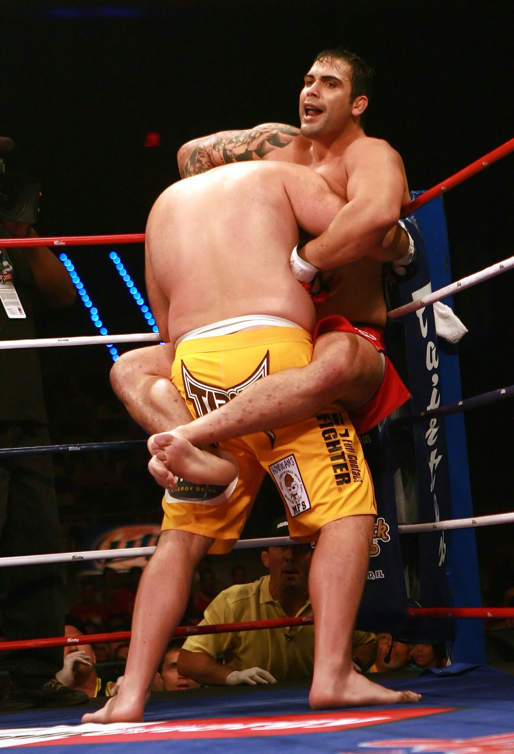 HOLLYWOOD, FL - SEPTEMBER 20:  Ricco Rodriguez (red trunks) fights against Ben Rothwell (yellow trunks) during their heavyweight bout during the IFL finals at the Seminole Hard Rock Casino on September 20, 2007 in Hollywood, Florida.  (Photo by Doug Benc/