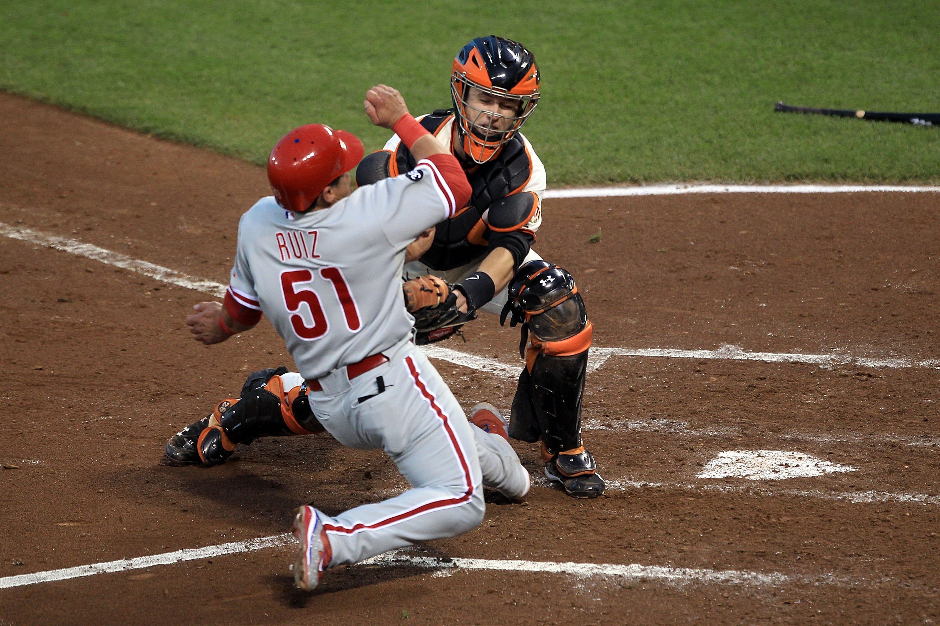 SAN FRANCISCO - OCTOBER 20:  Carlos Ruiz #51 of the Philadelphia Phillies is tagged out at the plate by catcher Buster Posey #28 of the San Francisco Giants in the fifth inning of Game Four of the NLCS during the 2010 MLB Playoffs at AT&T Park on October