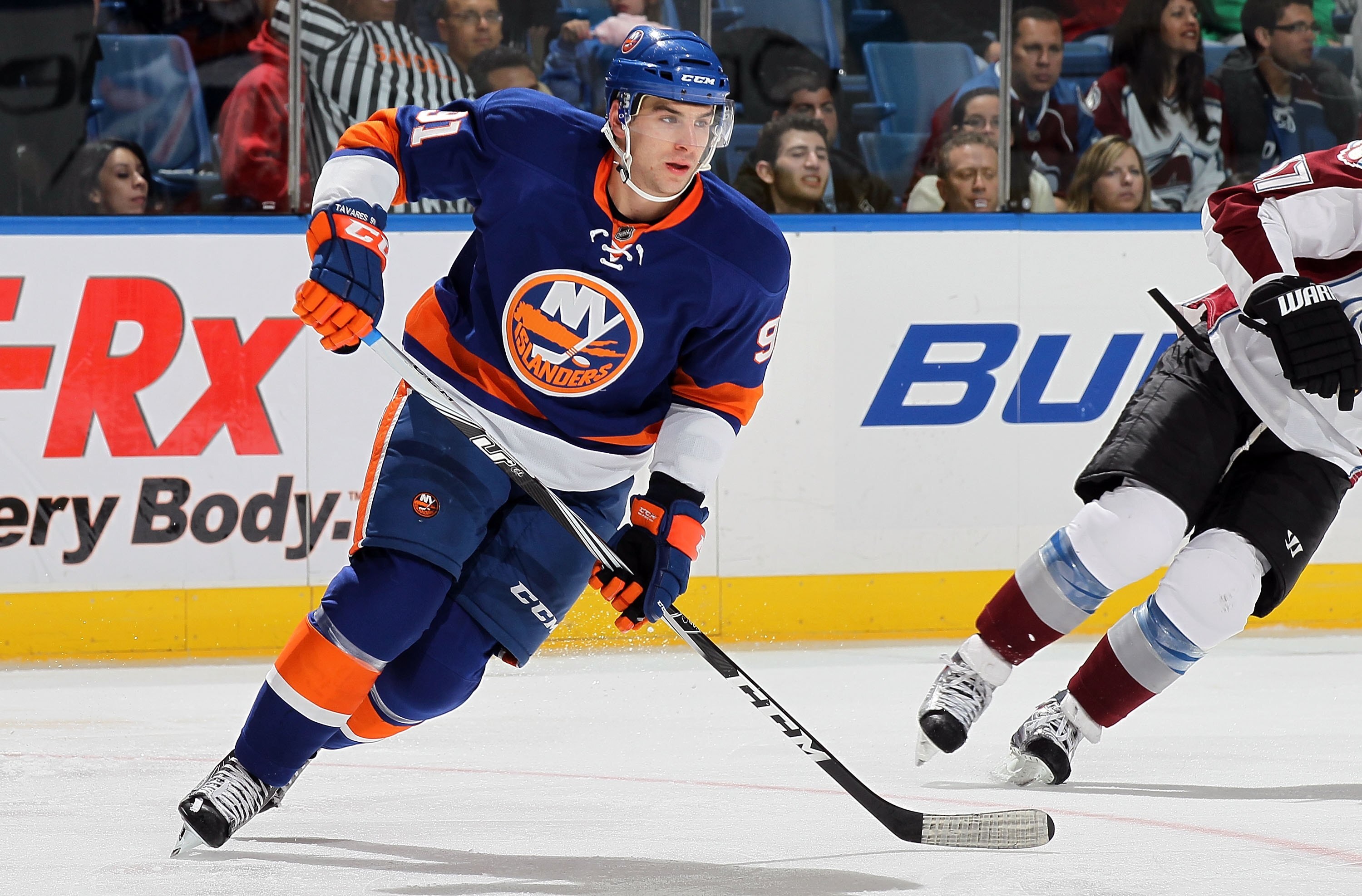 UNIONDALE, NY - OCTOBER 16:  John Tavares #91 of the New York Islanders skates against the Colorado Avalanche on October 16, 2010 at Nassau Coliseum in Uniondale, New York. The Isles defeated the Avalanche 5-2.  (Photo by Jim McIsaac/Getty Images)