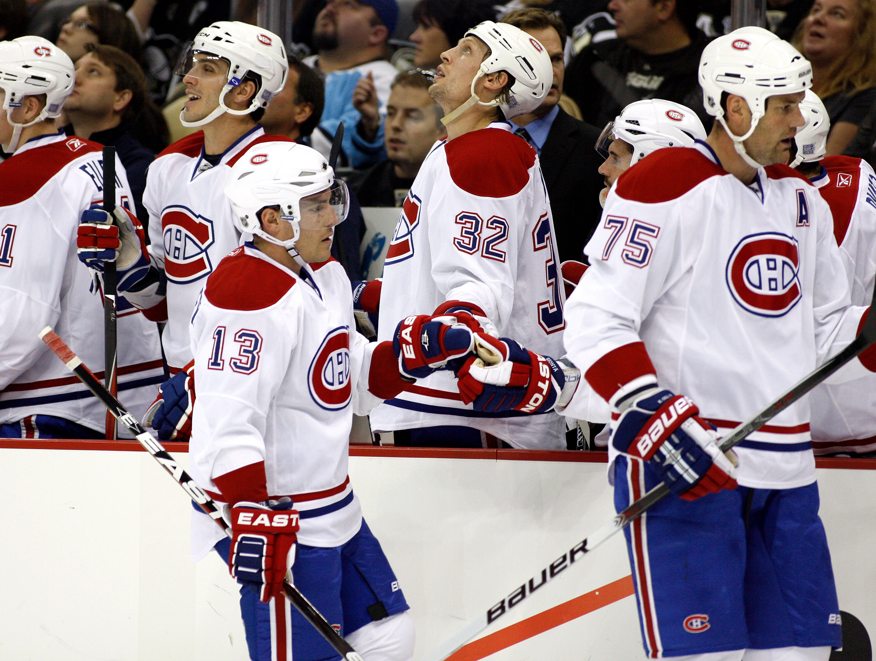 PITTSBURGH - OCTOBER 9:  Michael Cammalleri #13 of the Montreal Canadiens celebrates his first period goal with teammates against the Pittsburgh Penguins at Consol Energy Center on October 9, 2010 in Pittsburgh, Pennsylvania.  (Photo by Justin K. Aller/Ge