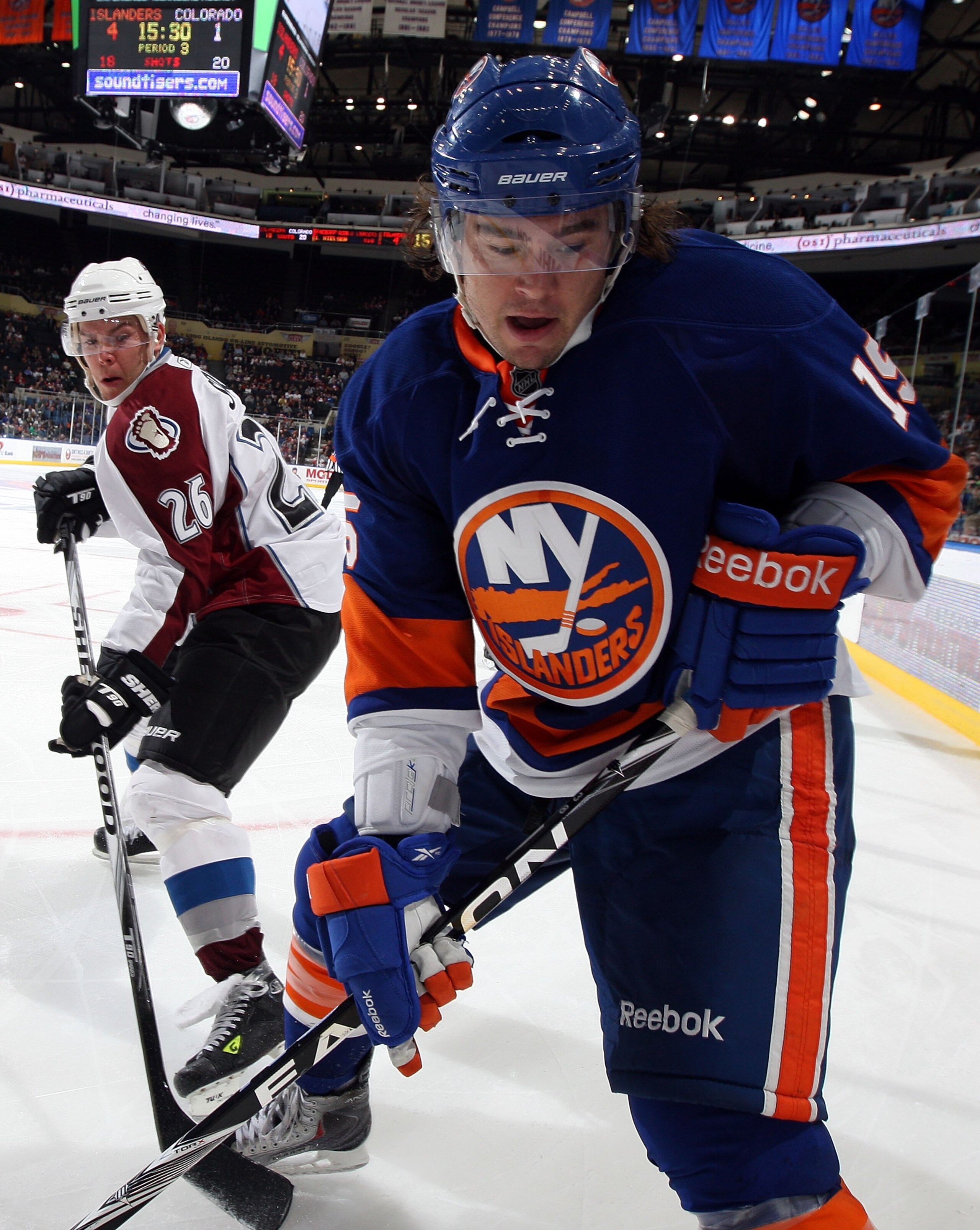 UNIONDALE, NY - OCTOBER 16: PA Parenteau #15 of the New York Islanders skates against Paul Stastny #26 of the Colorado Avalanche on October 16, 2010 at Nassau Coliseum in Uniondale, New York. (Photo by Jim McIsaac/Getty Images) UNIONDALE, NY - OCTOBER 16: PA Parenteau #15 of the New York Islanders skates against Paul Stastny #26 of the Colorado Avalanche on October 16, 2010 at Nassau Coliseum in Uniondale, New York. (Photo by Jim McIsaac/Getty Images)