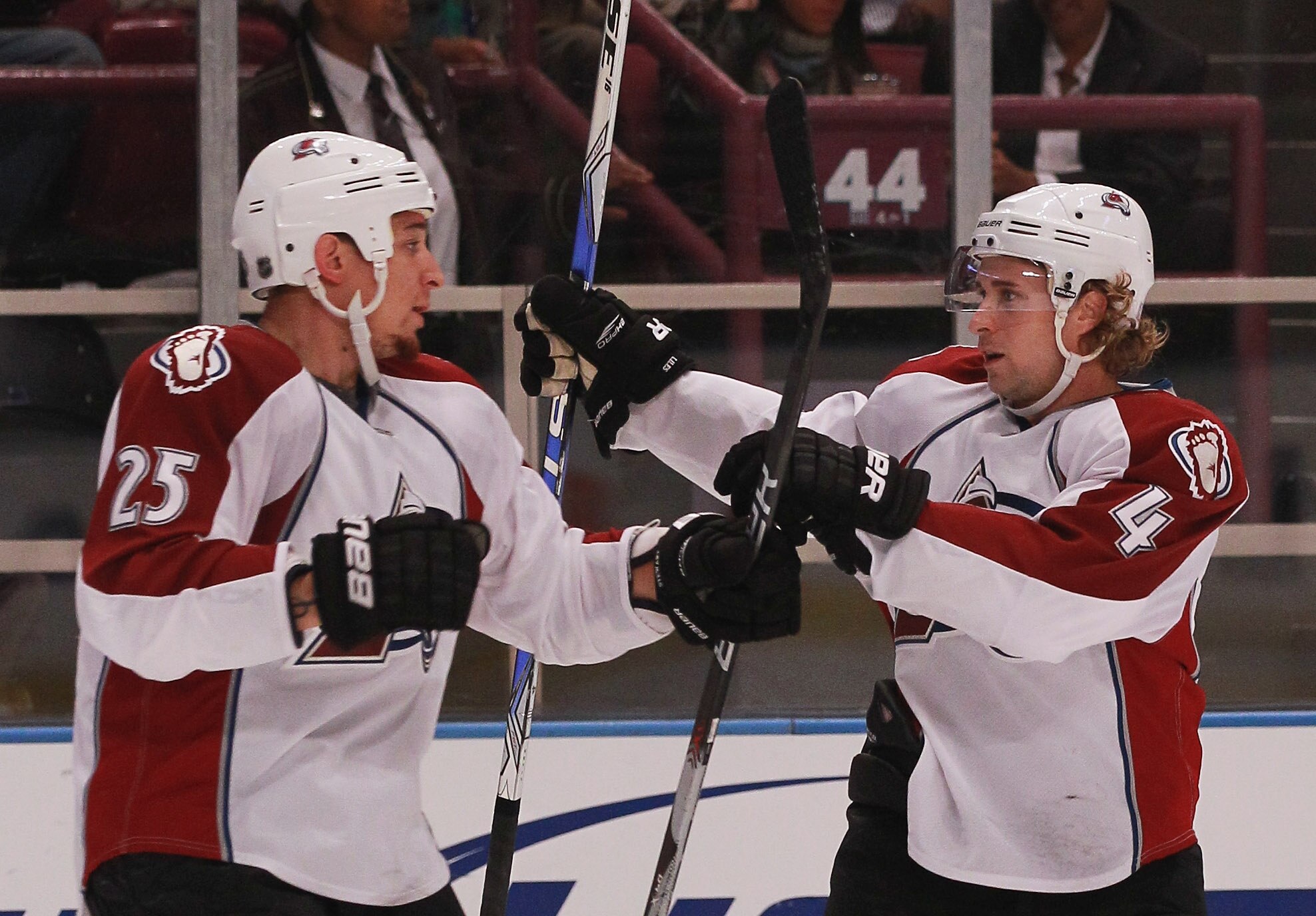 NEW YORK - OCTOBER 18: Chris Sewart #25 of the Colorado Avalanche congratulates John-Michael Liles #4 on his first period goal against the New York Rangers  at Madison Square Garden on October 18, 2010 in New York City.  (Photo by Bruce Bennett/Getty Imag