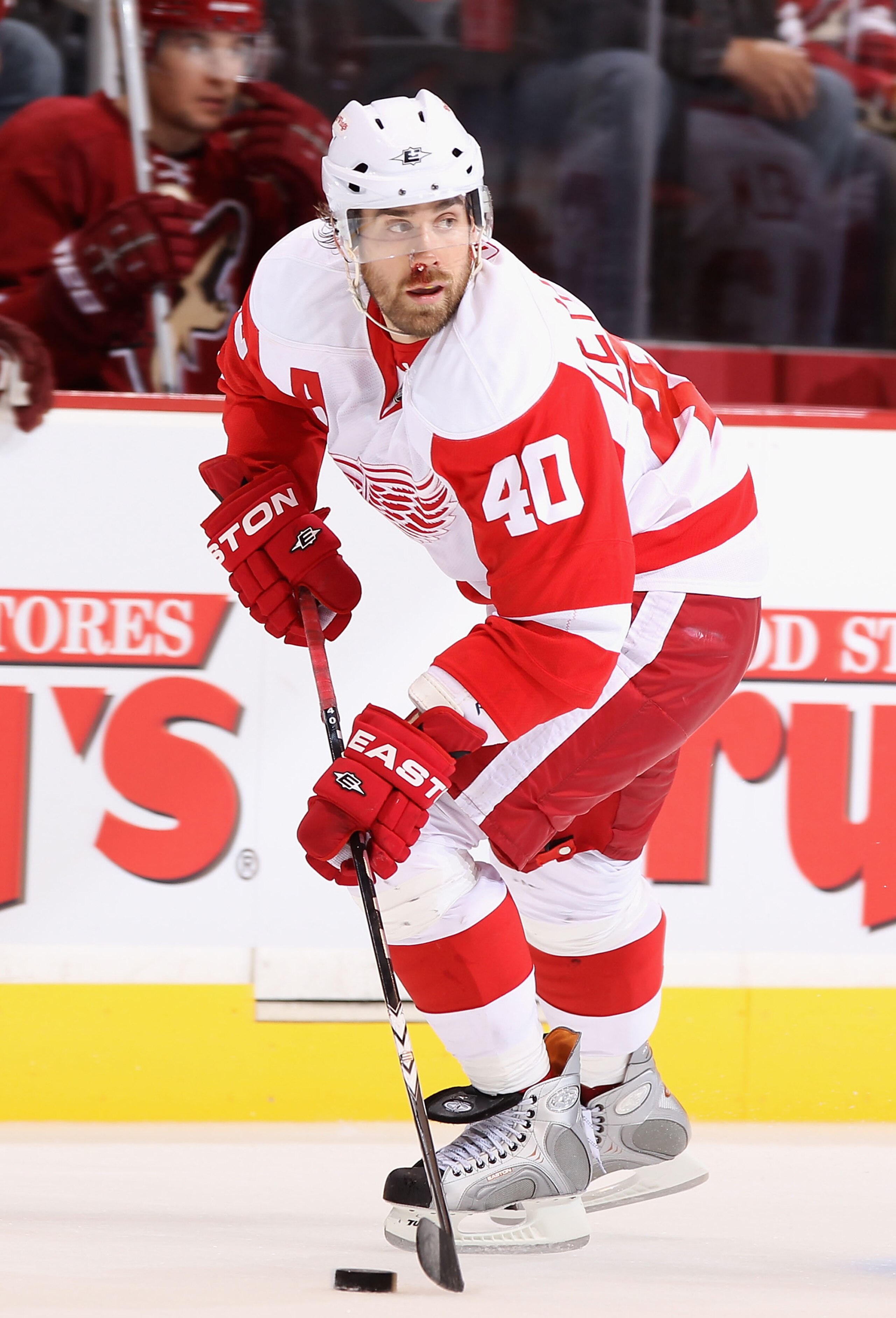 GLENDALE, AZ - OCTOBER 16:  Henrik Zetterberg #40 of the Detroit Red Wings skates with the puck during the NHL game against the Phoenix Coyotes at Jobing.com Arena on October16, 2010 in Glendale, Arizona.  The Red Wings defeated the Coyotes 2-1 in overtim