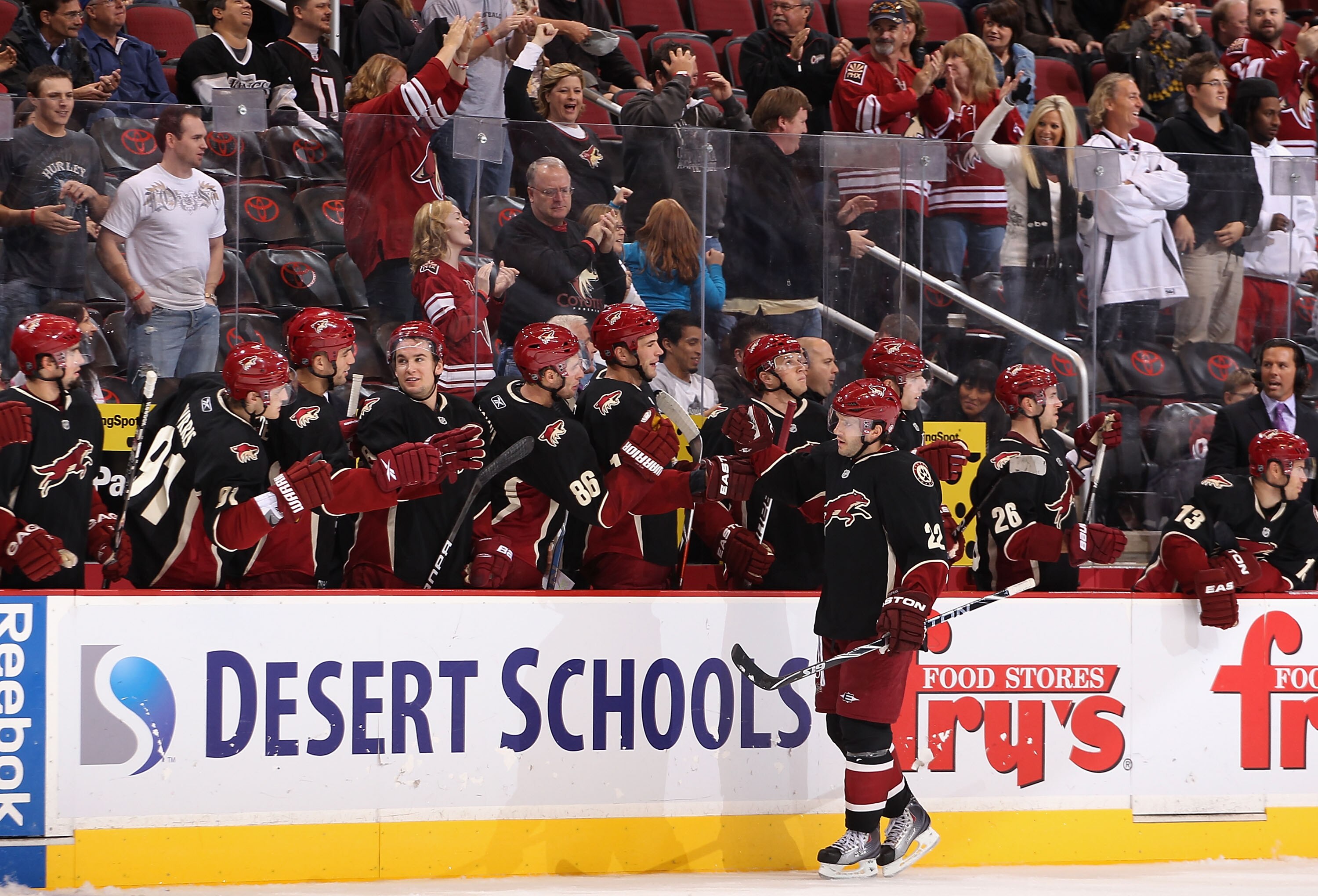 GLENDALE, AZ - OCTOBER 21:  Lee Stempniak #22 of the Phoenix Coyotes celebrates with teammates on the bench after scoring his third goal against the Los Angeles Kings during the thrid period of the NHL game at Jobing.com Arena on October 21, 2010 in Glend