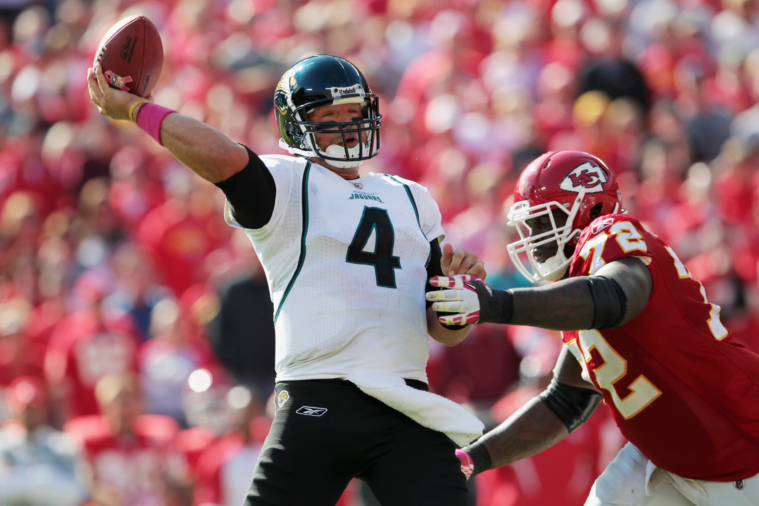 KANSAS CITY, MO - OCTOBER 24:  Quarterback Todd Bouman #4 of the Jacksonville Jaguars passes as Glenn Dorsey #72 of the Kansas City Chiefs defends during the game on October 24, 2010 at Arrowhead Stadium in Kansas City, Missouri.  (Photo by Jamie Squire/G
