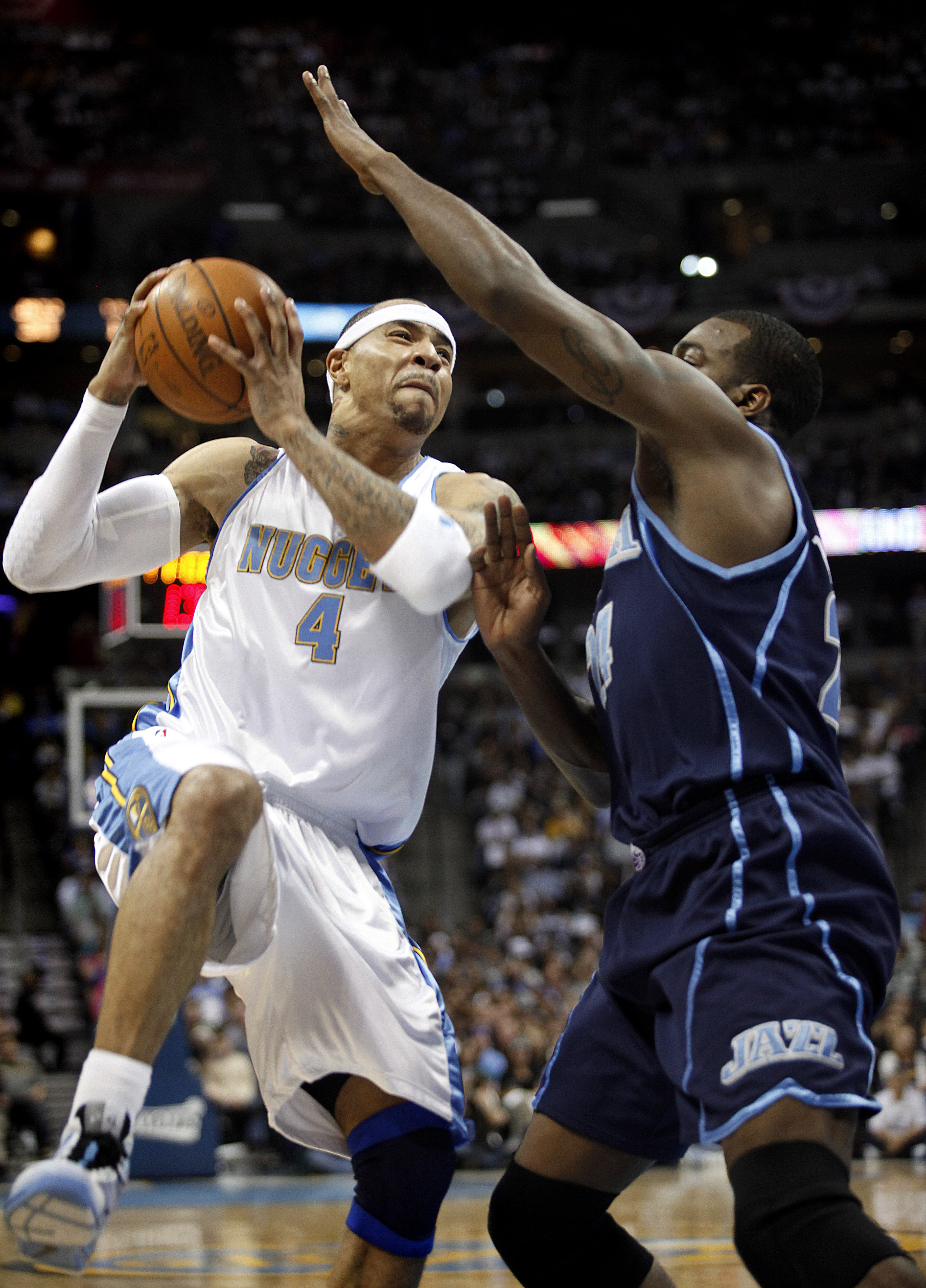 DENVER, CO - APRIL 17: Kenyon Martin #4 of the Denver Nuggets goes up for a shot against Paul Millsap #24 of the Utah Jazz during the first half of Game One of the Western Conference Quarterfinals of the 2010 NBA Playoffs at the Pepsi Center on April 17,