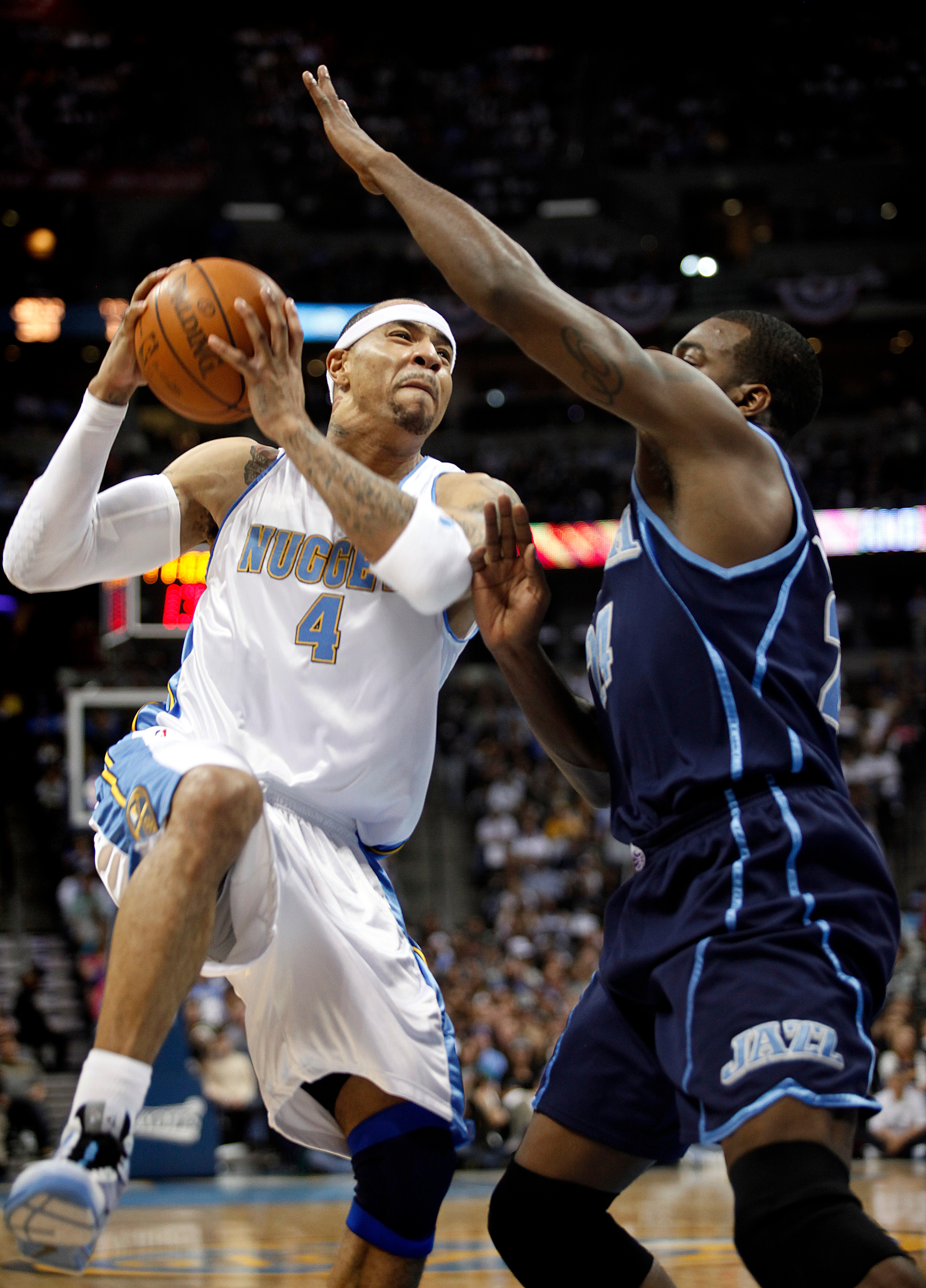 DENVER, CO - APRIL 17: Kenyon Martin #4 of the Denver Nuggets goes up for a shot against Paul Millsap #24 of the Utah Jazz during the first half of Game One of the Western Conference Quarterfinals of the 2010 NBA Playoffs at the Pepsi Center on April 17,