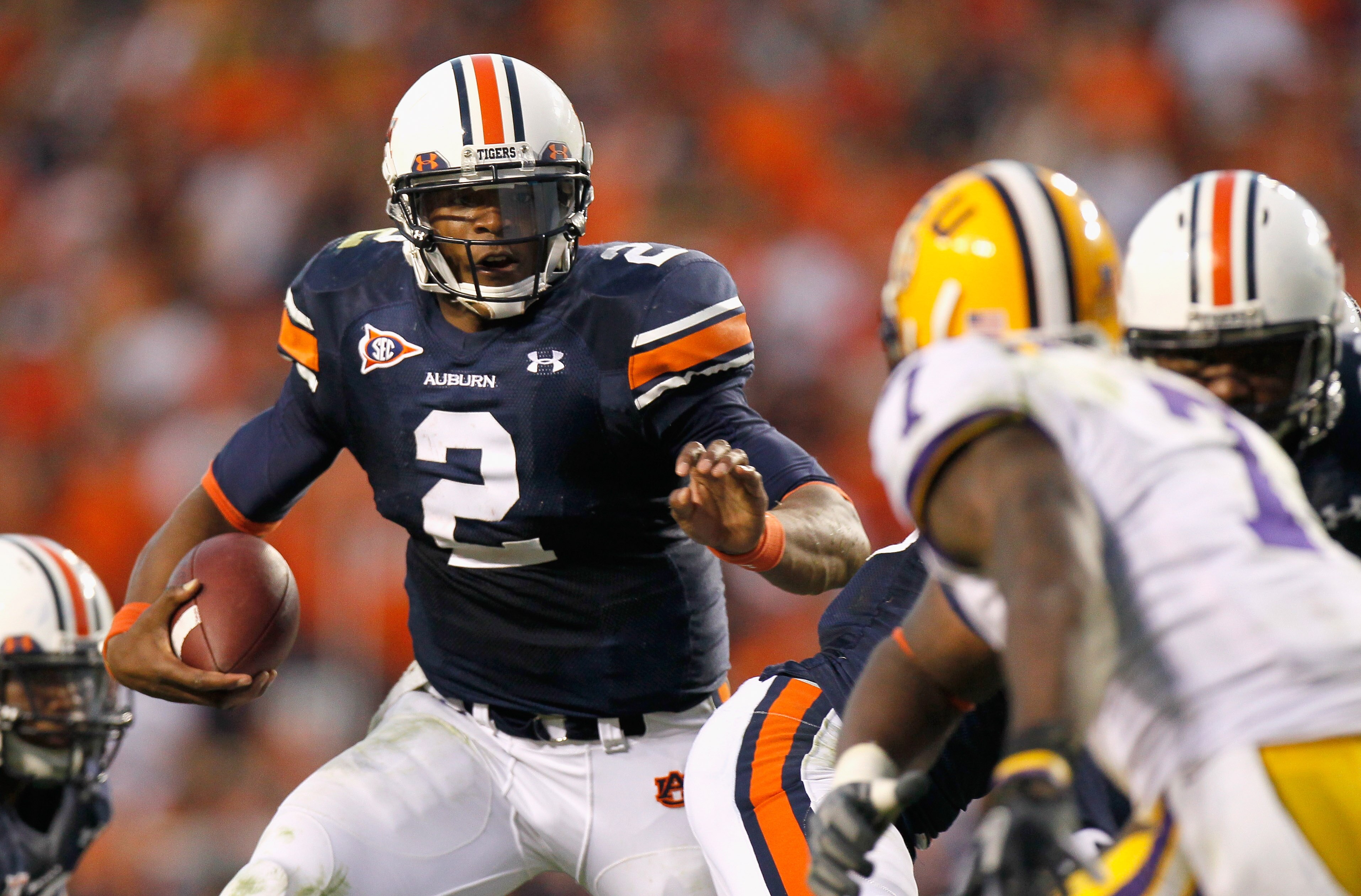 AUBURN, AL - OCTOBER 23: Quarterback Cameron Newton #2 of the Auburn Tigers rushes upfield against the LSU Tigers at Jordan-Hare Stadium on October 23, 2010 in Auburn, Alabama. (Photo by Kevin C. Cox/Getty Images) AUBURN, AL - OCTOBER 23: Quarterback Cameron Newton #2 of the Auburn Tigers rushes upfield against the LSU Tigers at Jordan-Hare Stadium on October 23, 2010 in Auburn, Alabama. (Photo by Kevin C. Cox/Getty Images)