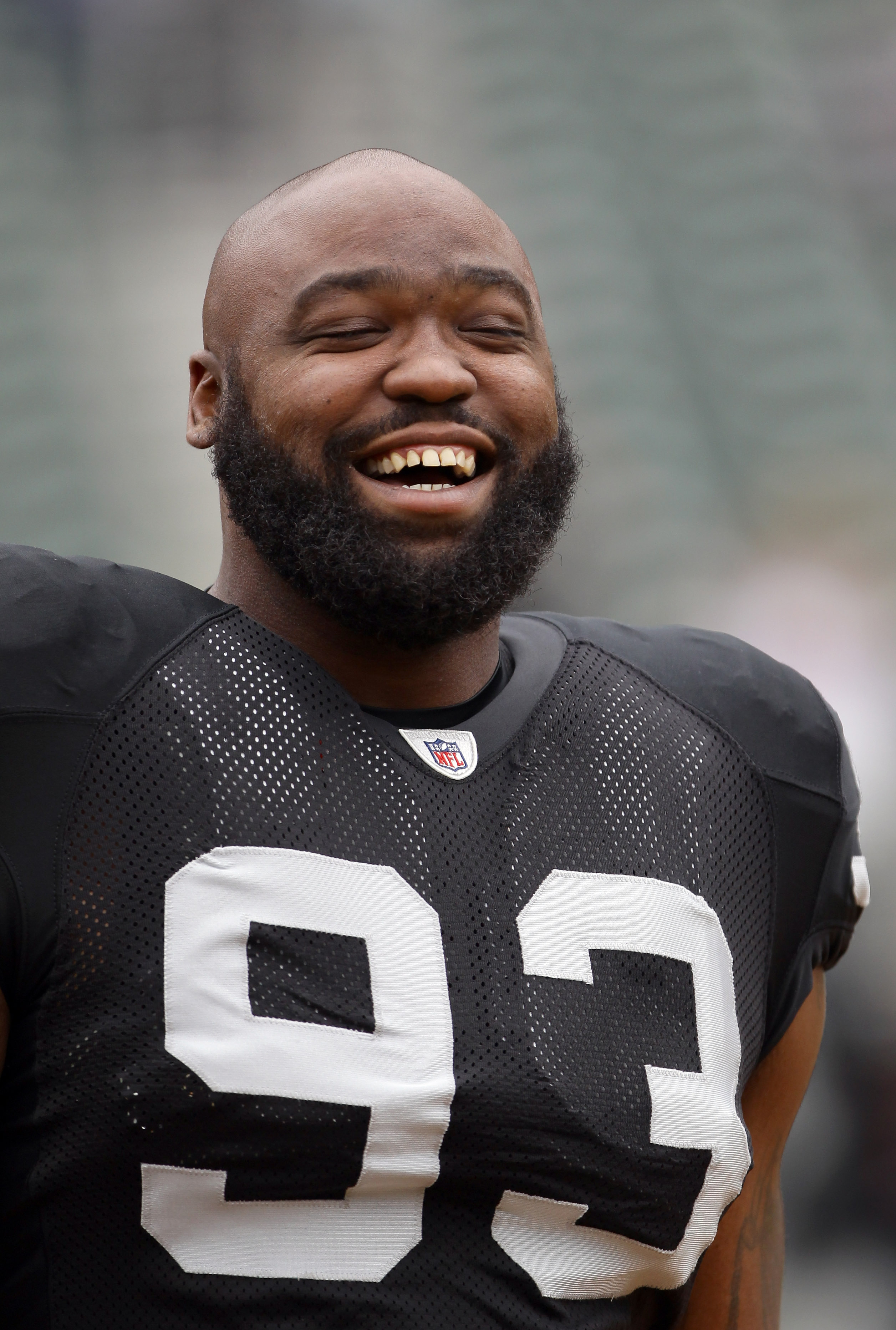 OAKLAND, CA - SEPTEMBER 19:  Tommy Kelly #93 of the Oakland Raiders warms up before their game against the St. Louis Rams at the Oakland-Alameda County Coliseum on September 19, 2010 in Oakland, California.  (Photo by Ezra Shaw/Getty Images)