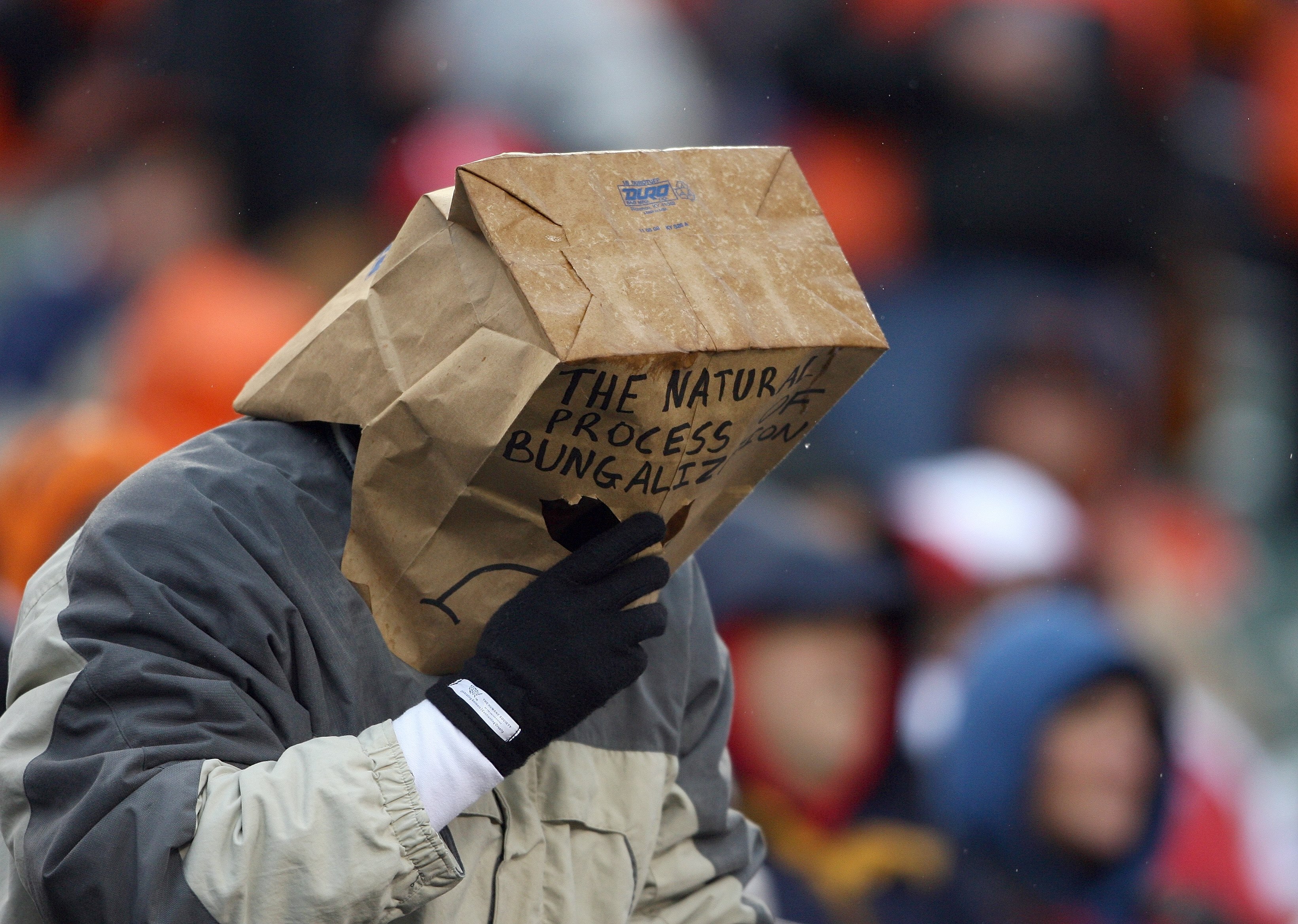 CINCINNATI - NOVEMBER 30:  A football spectator hangs his paper-bag-covered head during the NFL game between the Baltimore Ravens and the Cincinnati Bengals on November 30, 2008 at Paul Brown Stadium in Cincinnati, Ohio. The Ravens defeated the Bengals 34