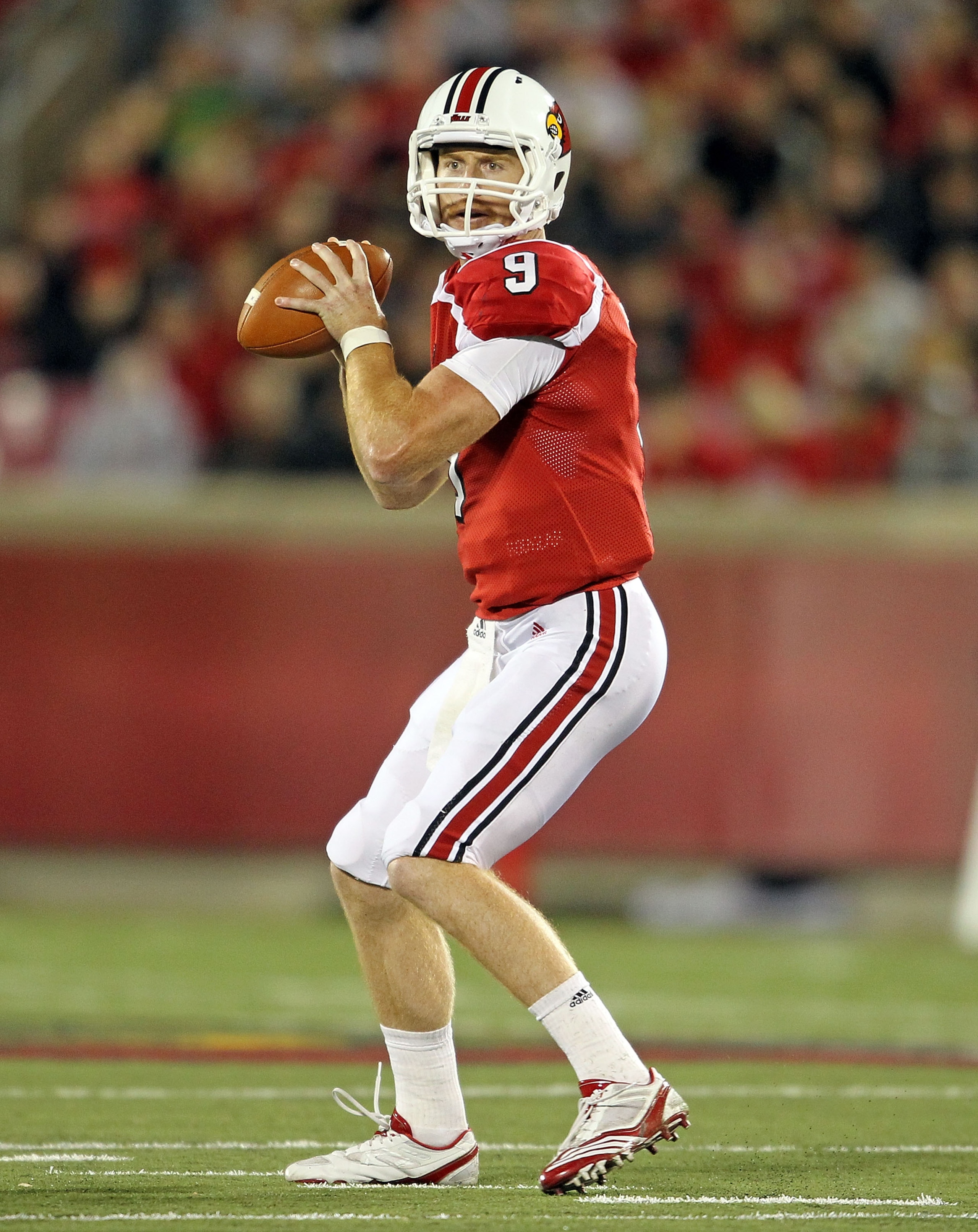 LOUISVILLE, KY - OCTOBER 15: Adam Froman #9 of  the Louisville Cardinals throws a pass during the Big East Conference game against the Cincinnati Bearcats at Papa John's Cardinal Stadium on October 15, 2010 in Louisville, Kentucky.  (Photo by Andy Lyons/G